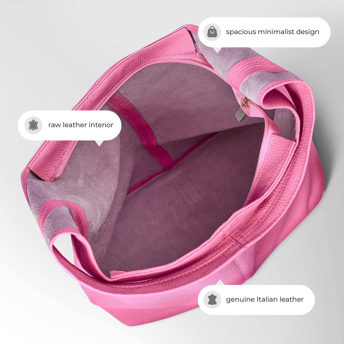 A top view of an open pink Italian leather bag with raw leather interior, highlighting its spacious minimalist design and genuine material with labeled callouts.