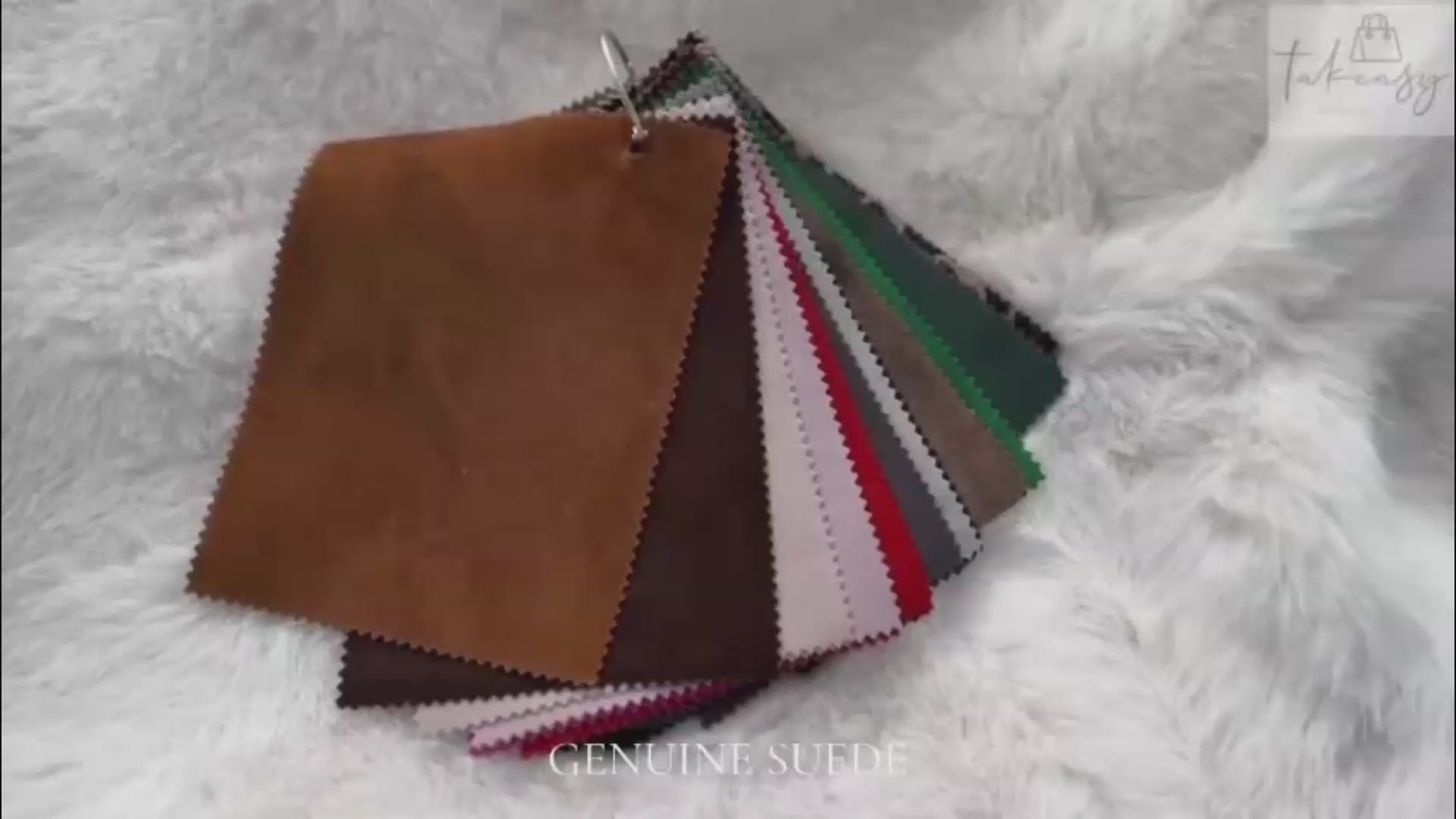 Load video: Swatch ring with leather and suede samples in multiple colors — no filters