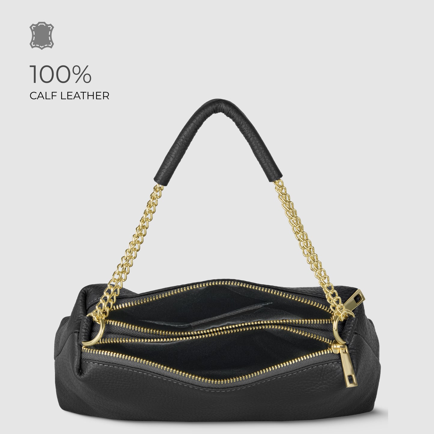 A black Italian leather bag with gold chain handles and two open zippered compartments, displayed against a light gray background with the text 100% Calf Leather in the corner.