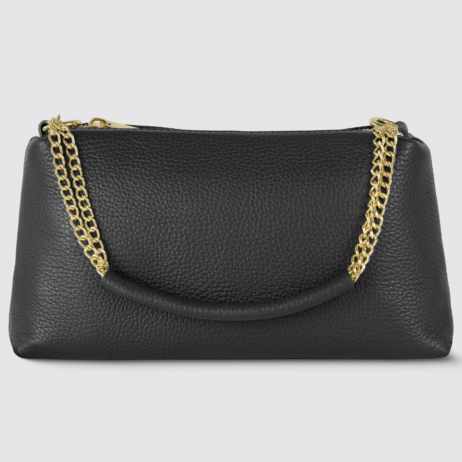 A black Italian leather bag with a pebbled texture, featuring a gold chain strap draped over the top, set against a plain light gray background.