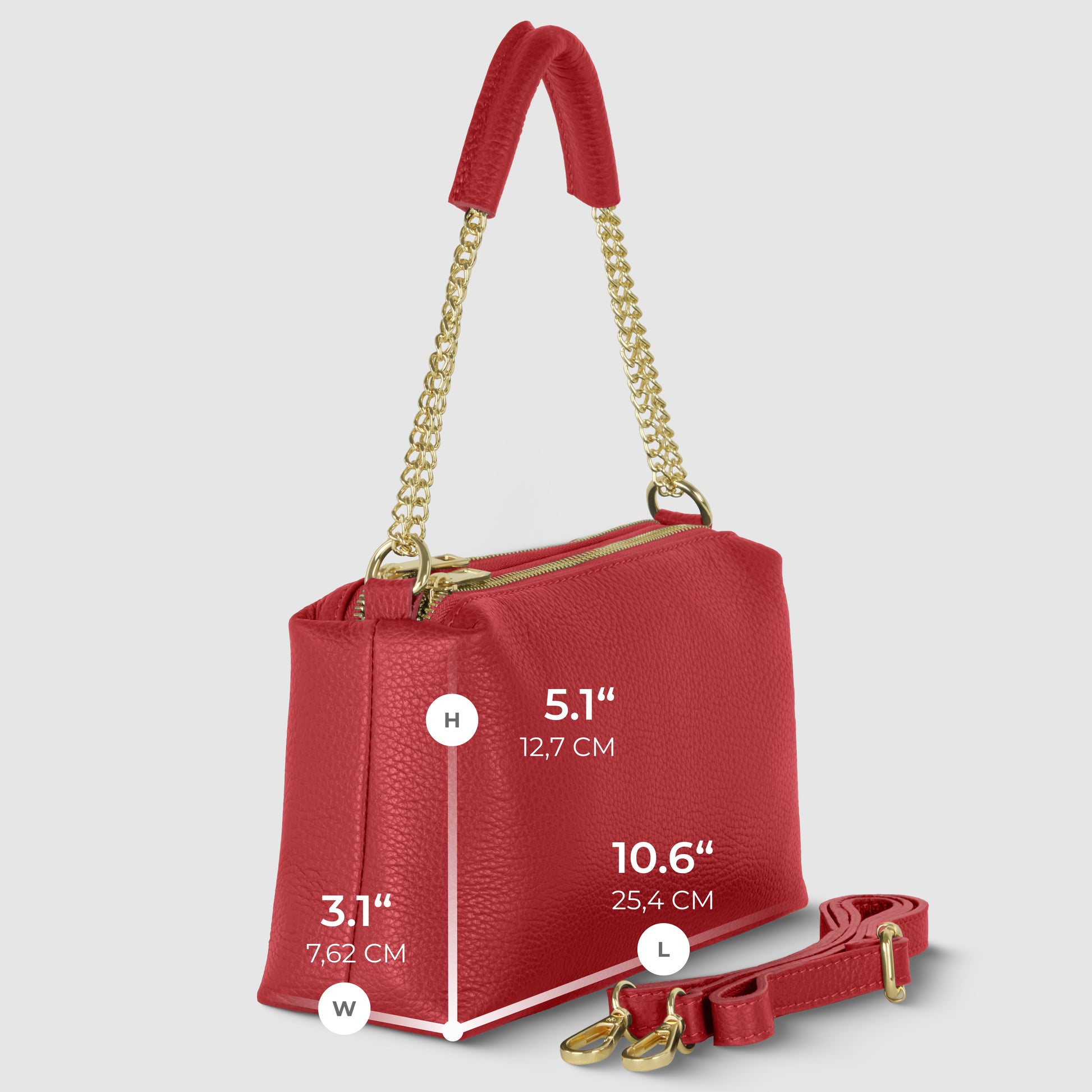 This elegant shoulder bag features gold chain handles, a detachable strap, and is crafted from fine Italian leather. Its compact size—height 5.1" (12.7 cm), width 3.1" (7.62 cm), length 10.6" (25.4 cm)—is perfect for any occasion.