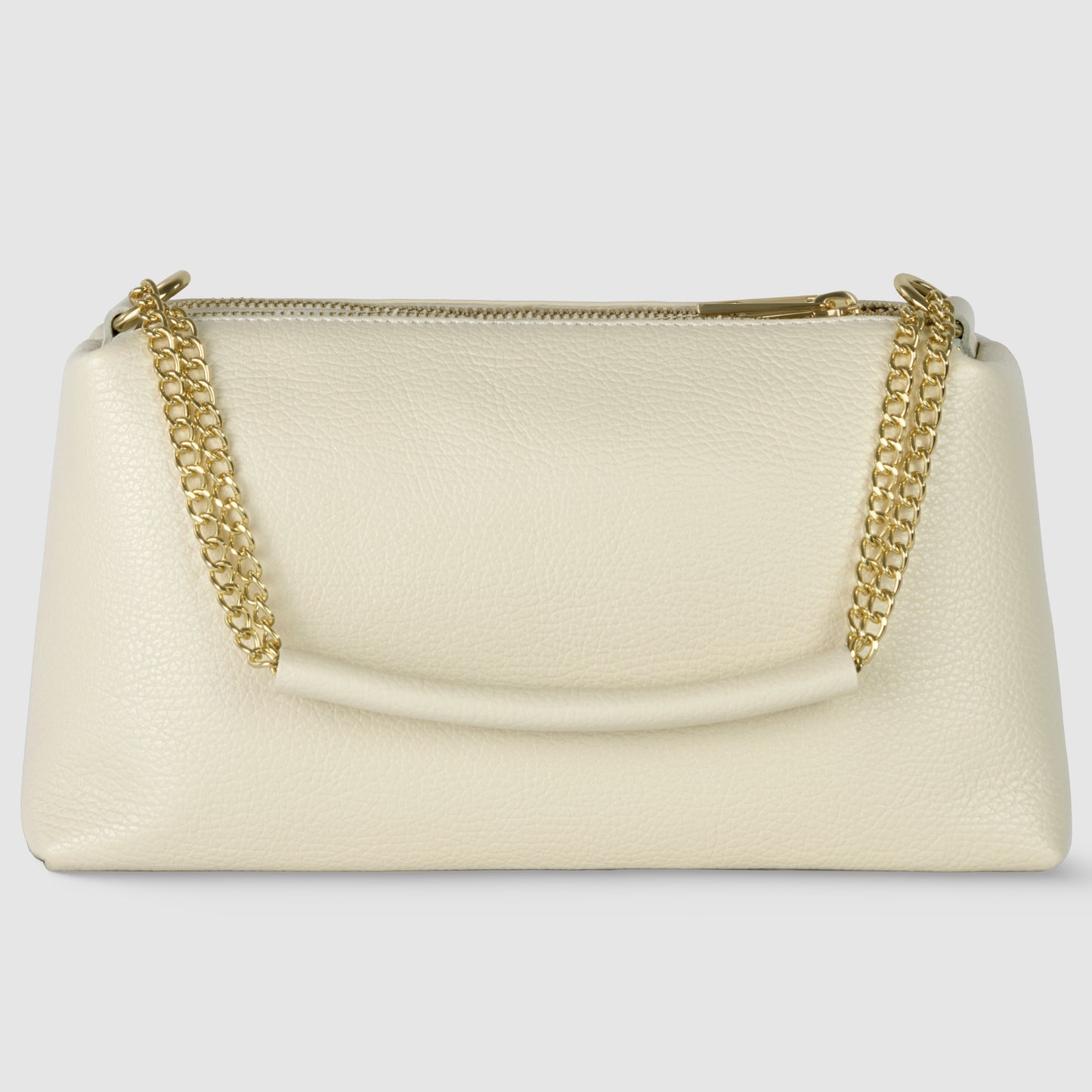 A cream-colored calf leather handbag with a textured finish, featuring a gold chain strap and zipper closure on top, displayed against a plain light gray background.