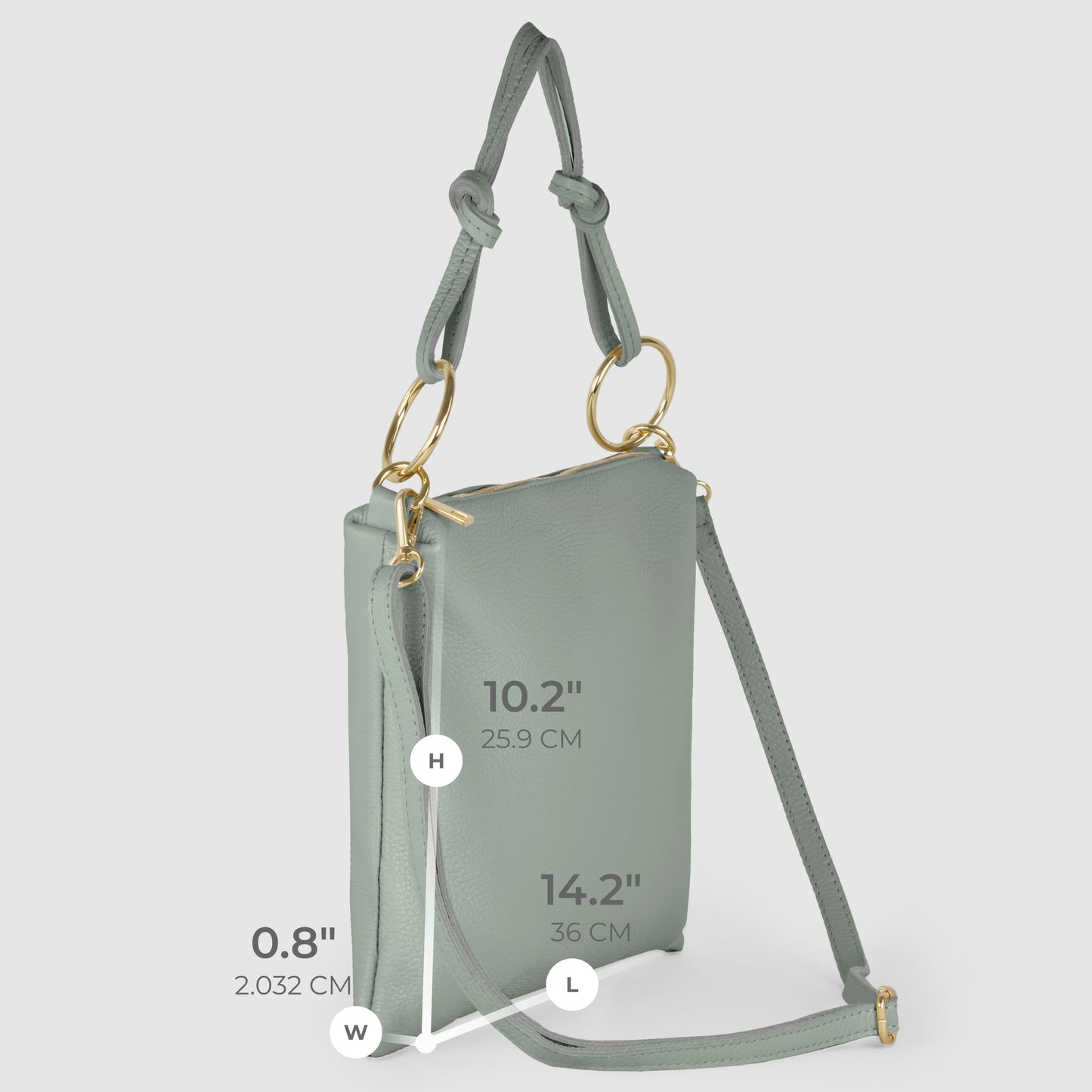 A light gray-green Italian leather handbag with gold hardware, shown standing upright. Dimensions are labeled: height 10.2 (25.9 cm), length 14.2 (36 cm), and width 0.8 (2.032 cm).