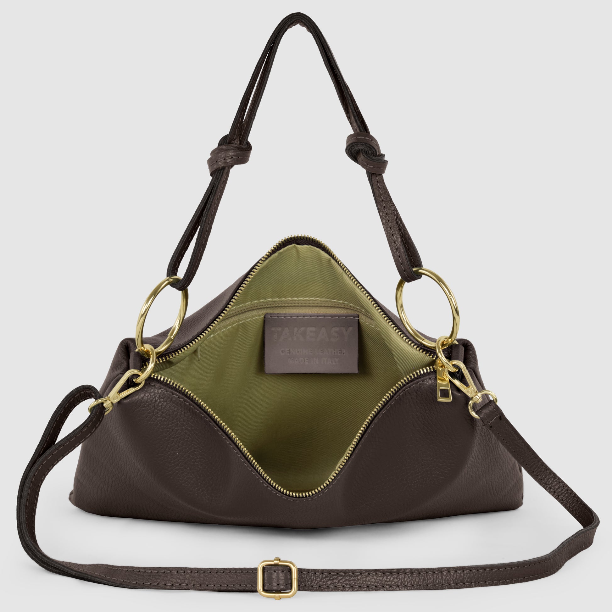 A dark brown Italian calf leather purse with gold hardware, an adjustable shoulder strap, and an open top revealing an olive green interior and a leather patch label inside.