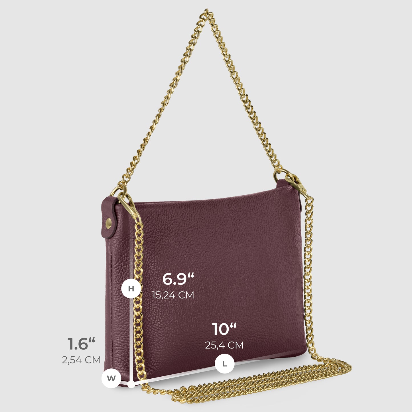 A handcrafted burgundy Italian leather crossbody purse with a gold chain strap. This elegant bag measures 10" (25.4 cm) in length, 6.9" (15.24 cm) in height, and 1.6" (2.54 cm) in width.