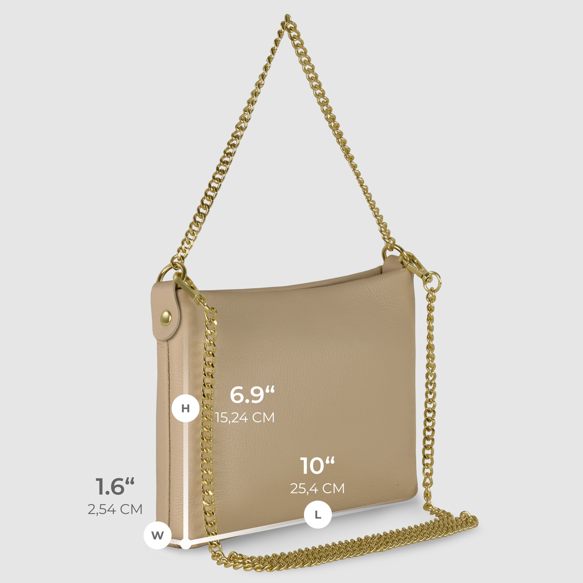 A beige Italian leather crossbody purse with a gold chain strap is shown against a gray background. The bag’s dimensions are labeled: height 6.9 (17.53 cm), length 10 (25.4 cm), and width 1.6 (2.54 cm).