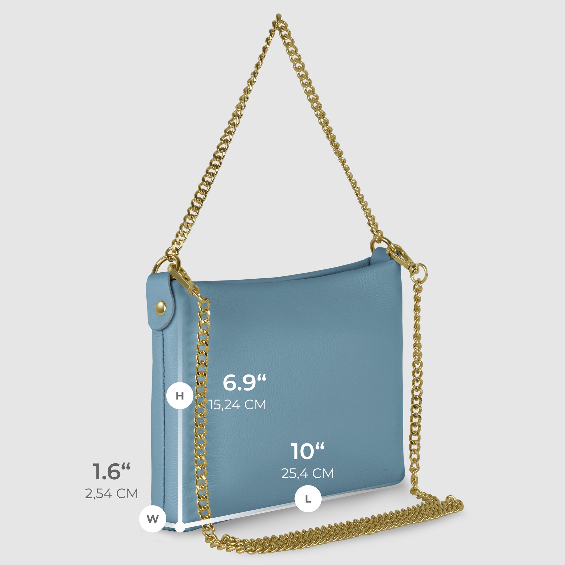 A light blue Italian leather crossbody purse with a gold chain strap is shown against a light gray background. The handcrafted handbag measures 6.9 H, 10 L, and 1.6 W, with dimensions labeled in both inches and centimeters.