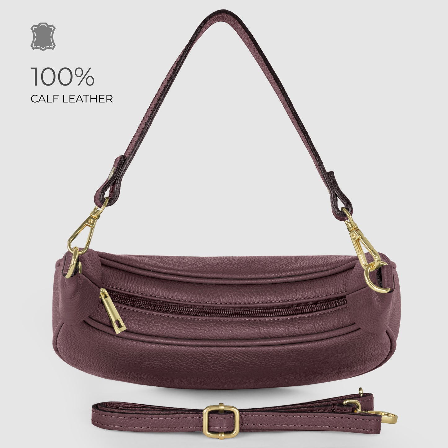 A maroon Italian calf leather crescent-shaped handbag with gold hardware, detachable shoulder strap, and zippered front pocket. Text reads 100% CALF LEATHER. Bag is displayed on a light grey background.