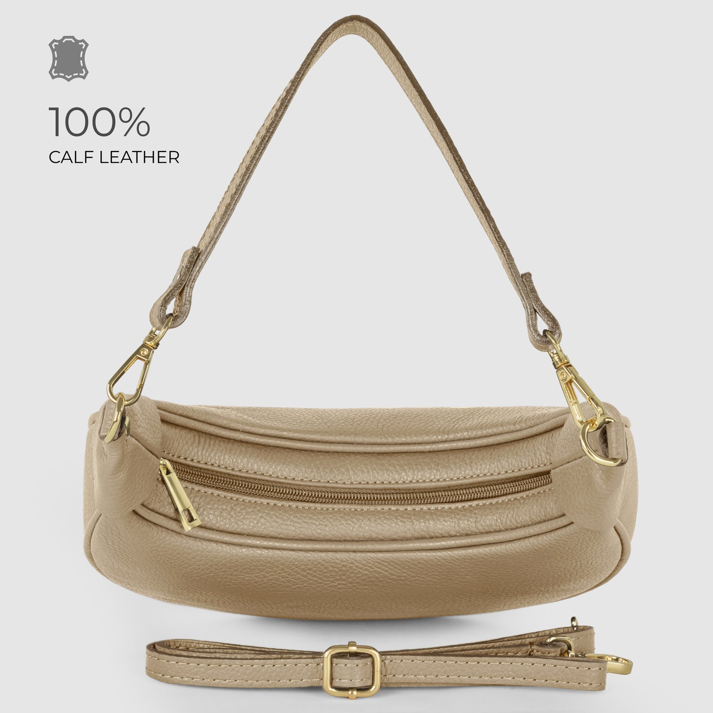 Beige crescent-shaped handbag in Italian calf leather with gold hardware, a detachable curved shoulder strap, front zip pocket, and adjustable long strap on display. Text reads 100% CALF LEATHER with a leather symbol on a light background.
