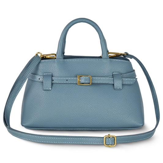 A small, structured Italian leather handbag in blue with gold buckles, short handles, and a long adjustable shoulder strap, handmade in Italy and displayed on a white background.