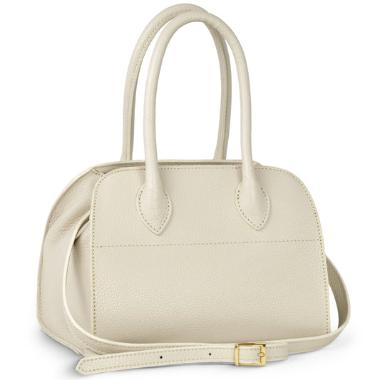 A cream-colored Italian leather handbag with two rounded handles and a detachable shoulder strap featuring a gold buckle, handcrafted in Italy and displayed on a white background.