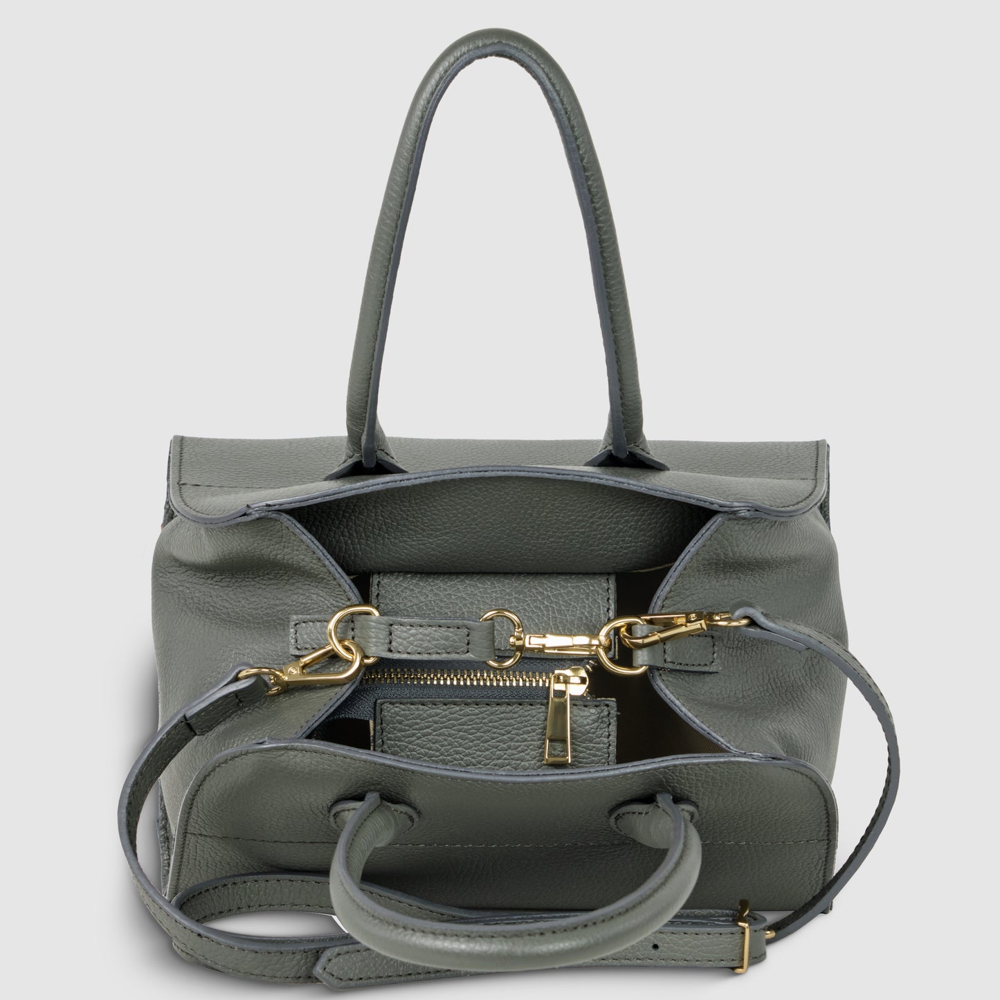 A grey Italian leather handbag with gold hardware, featuring two handles, an adjustable shoulder strap, and a partially open top showing interior pockets and compartments against a plain light background.