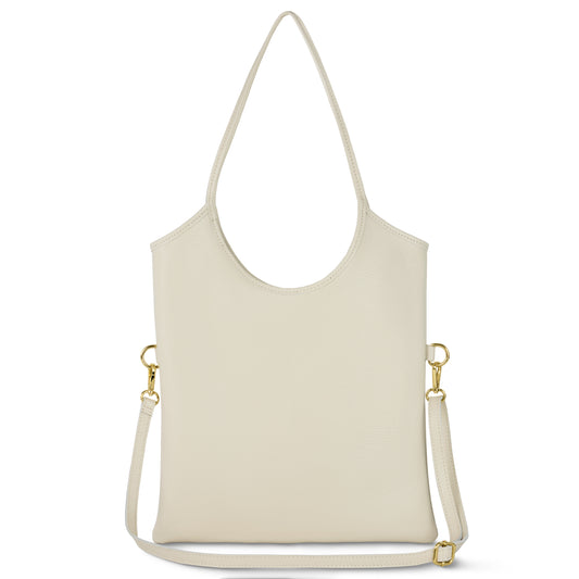 A minimalist, off-white Italian leather bag with a rounded handle and detachable shoulder strap featuring gold hardware, showcased against a white background—an elegant example of Florentine craftsmanship.