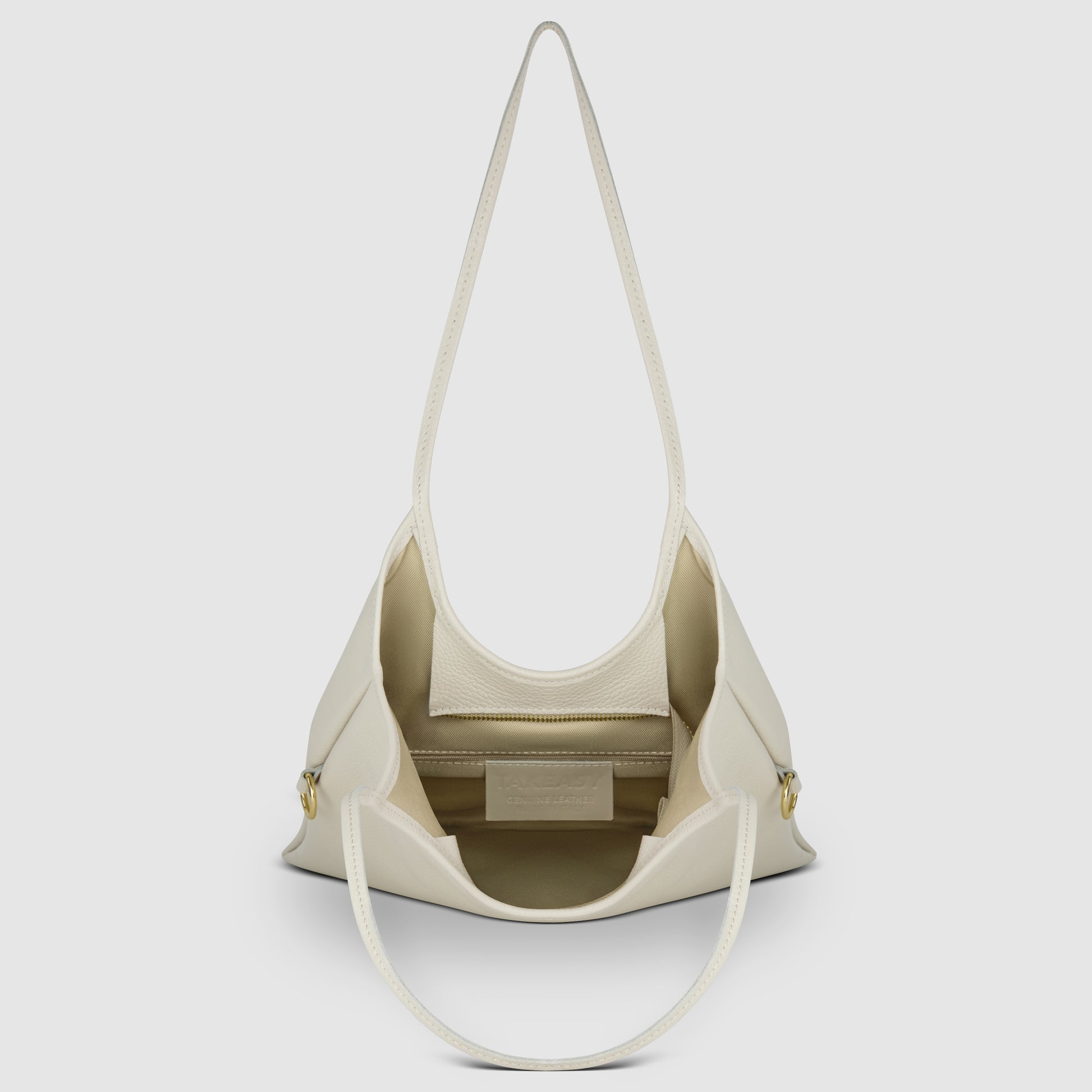 A cream-colored Italian leather bag with two shoulder straps, shown open to reveal a spacious interior, an inner zip pocket, and gold button details—an ideal everyday shoulder bag crafted with timeless Florentine craftsmanship.