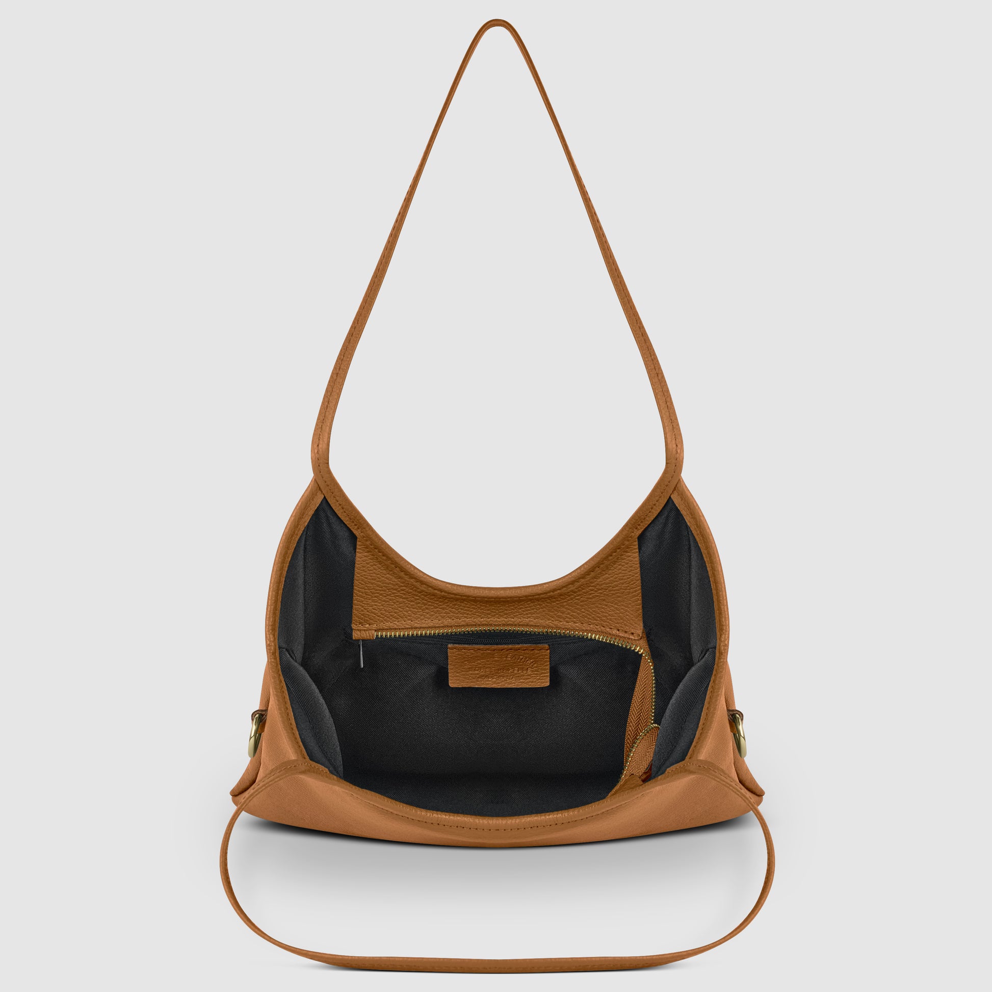 A brown Italian leather bag with a wide strap, shown open to reveal a spacious black interior and an inner zippered pocket—a perfect everyday shoulder bag showcasing Florentine craftsmanship.