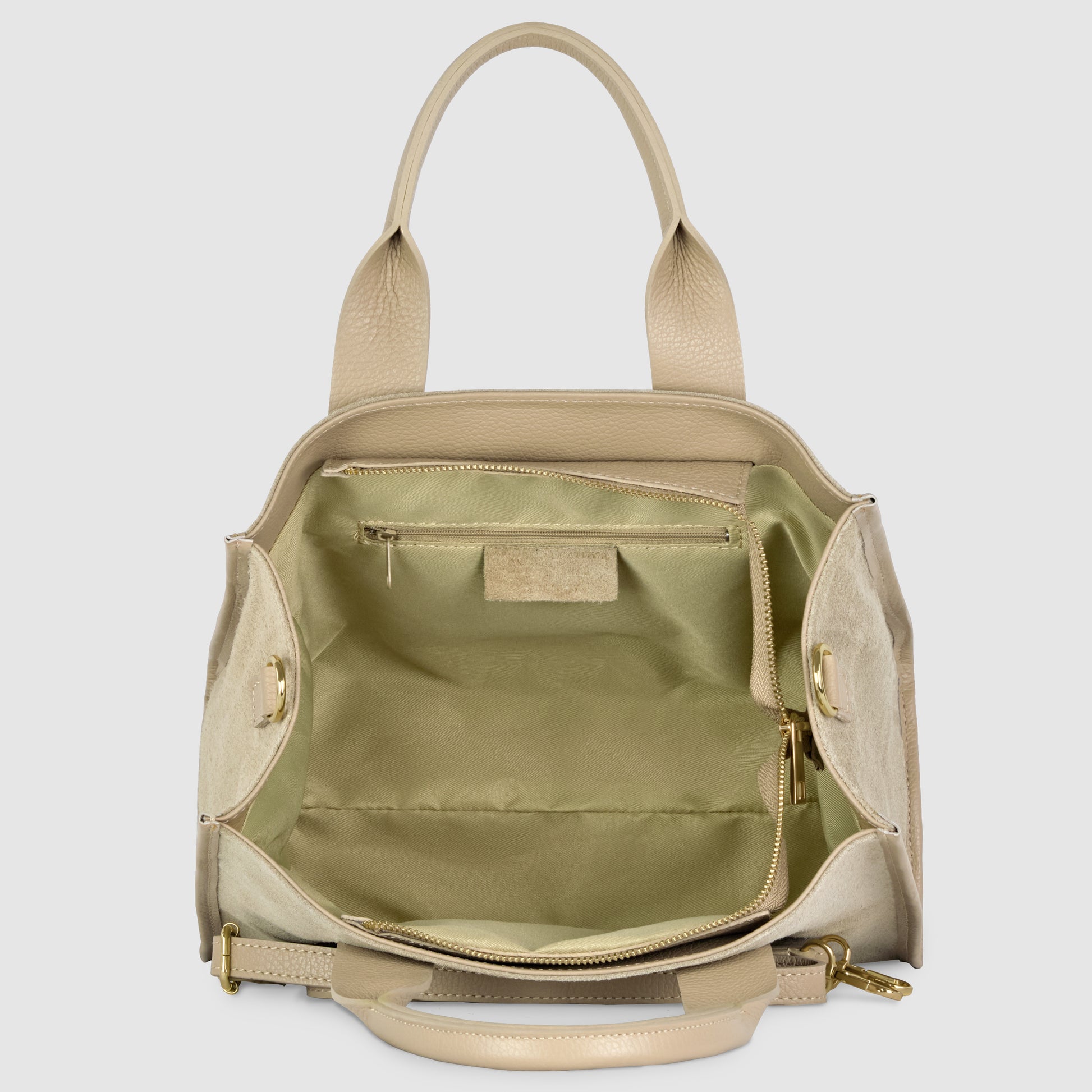 A beige handmade Italian bag with an open top, featuring a spacious light green interior, an inner zippered pocket, and gold hardware. With two handles and a removable shoulder strap, it doubles as a chic crossbody shoulder bag.