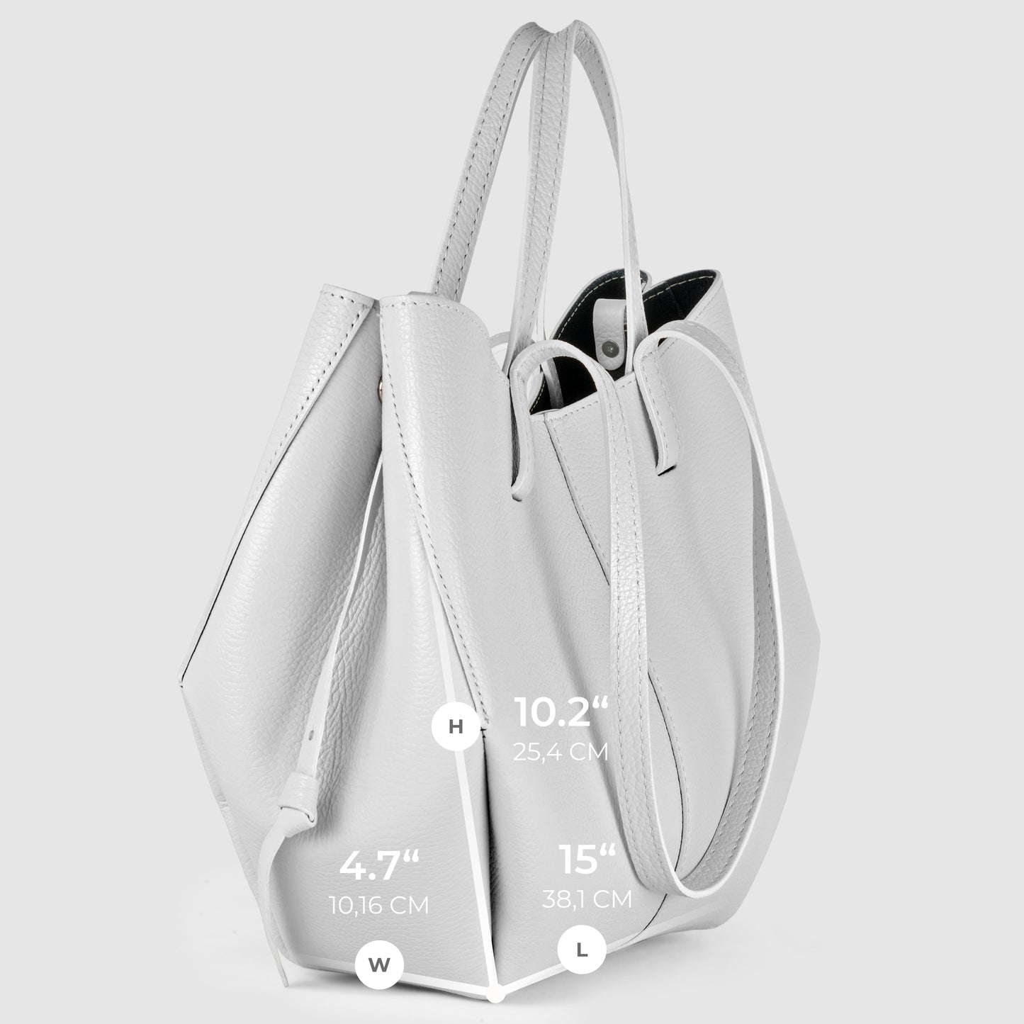 A light gray Italian leather handbag with two handles, shown at an angle. Dimensions are labeled: height 10.2 (25.4 cm), width 4.7 (10.16 cm), and length 15 (38.1 cm).