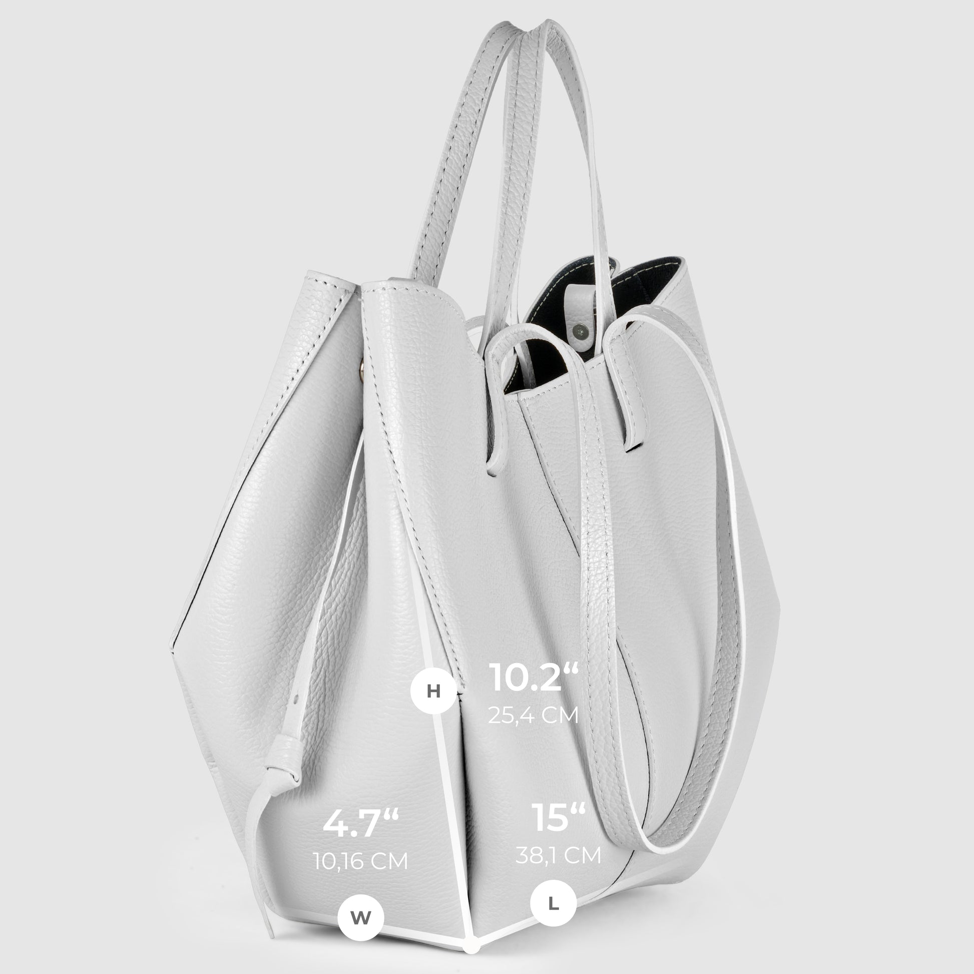 A light gray Italian leather handbag with two handles, shown at an angle. Dimensions are labeled: height 10.2 (25.4 cm), width 4.7 (10.16 cm), and length 15 (38.1 cm).