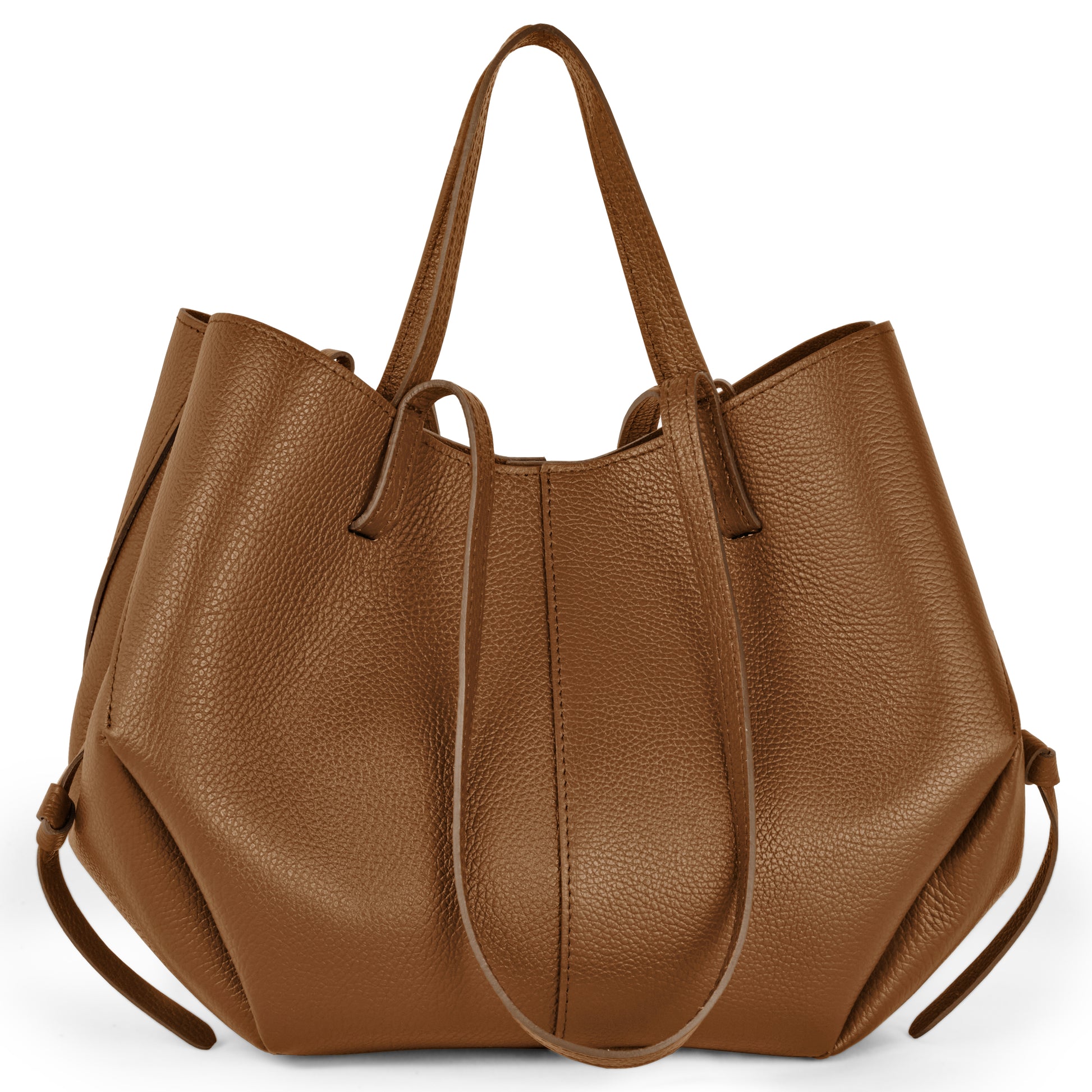 A large brown handbag with two handles, side drawstrings, and a textured surface stands upright against a white background.