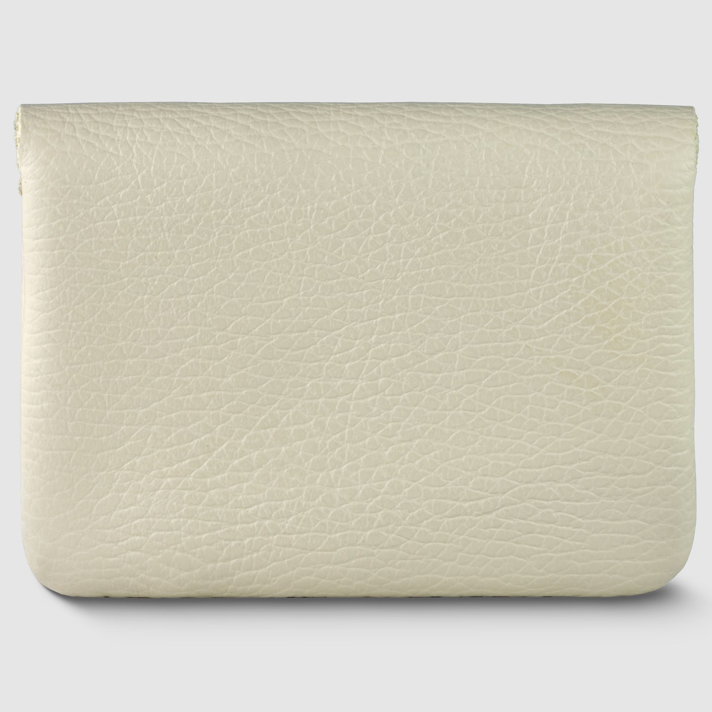 A beige, textured Italian leather wallet with a simple, rectangular shape, shown against a light gray background. The minimalist wallet is closed and features no visible zippers, buttons, or logos.