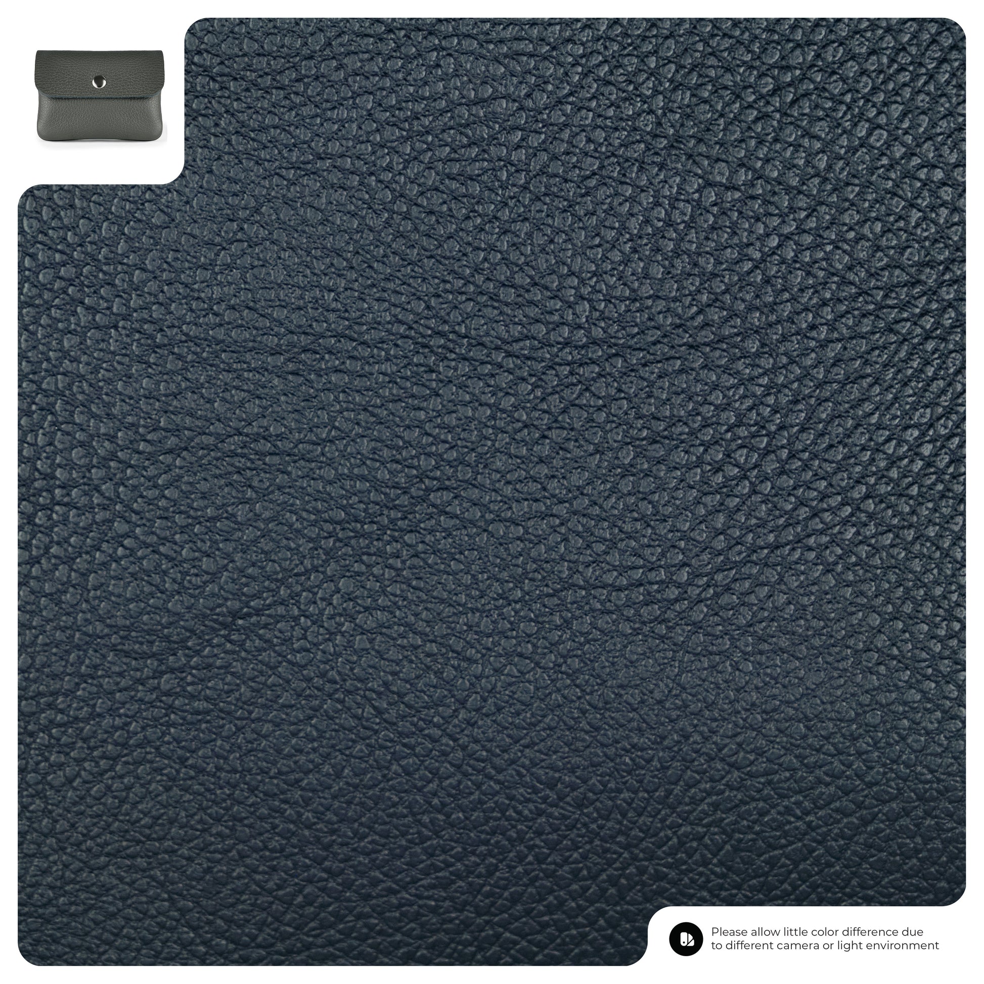 A close-up of textured dark gray leather material with a minimal wallet in the top left corner and a note about color differences in the bottom right corner.