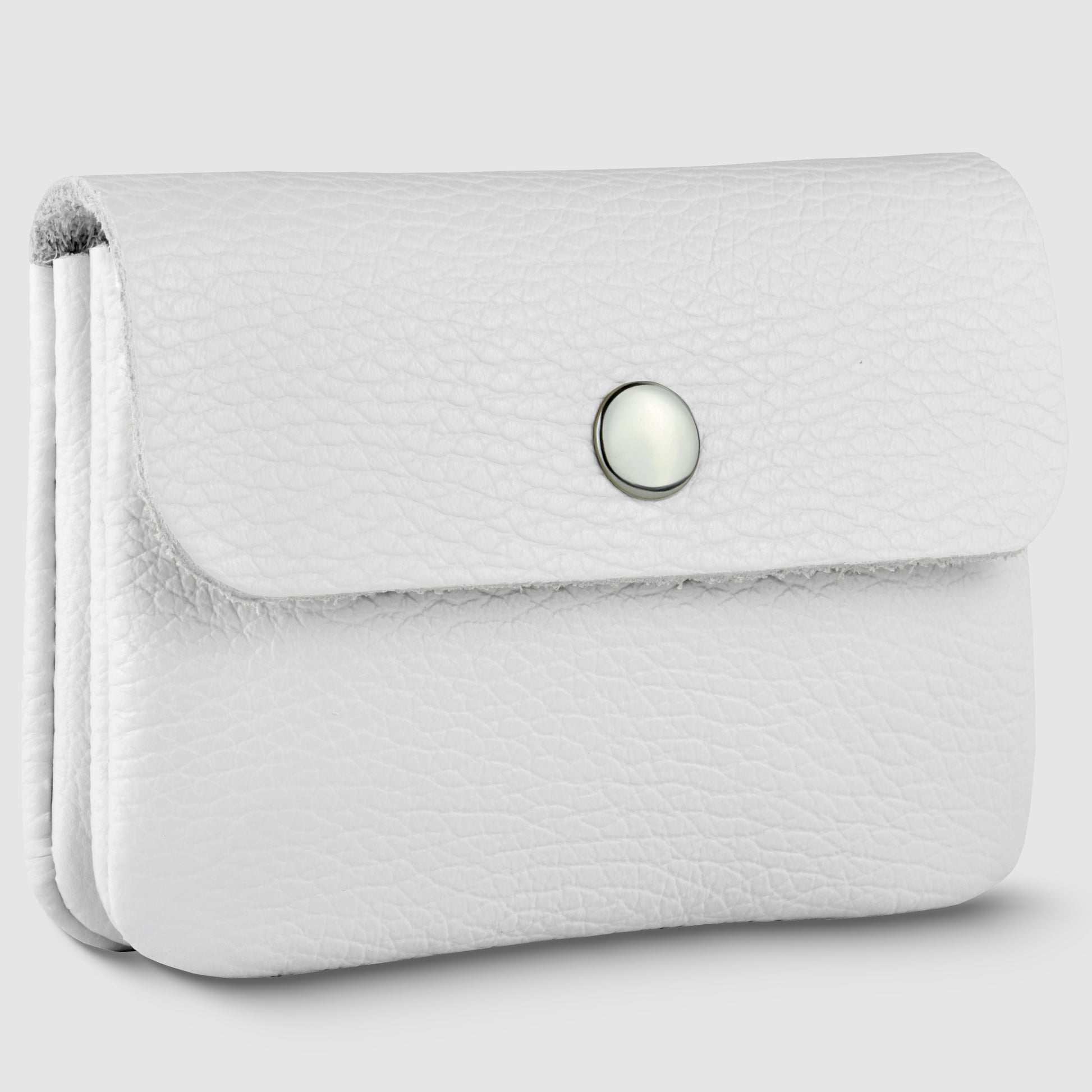 A small handmade wallet crafted from white Italian leather features a flap closure, secured by a round silver snap button, shown against a light gray background.