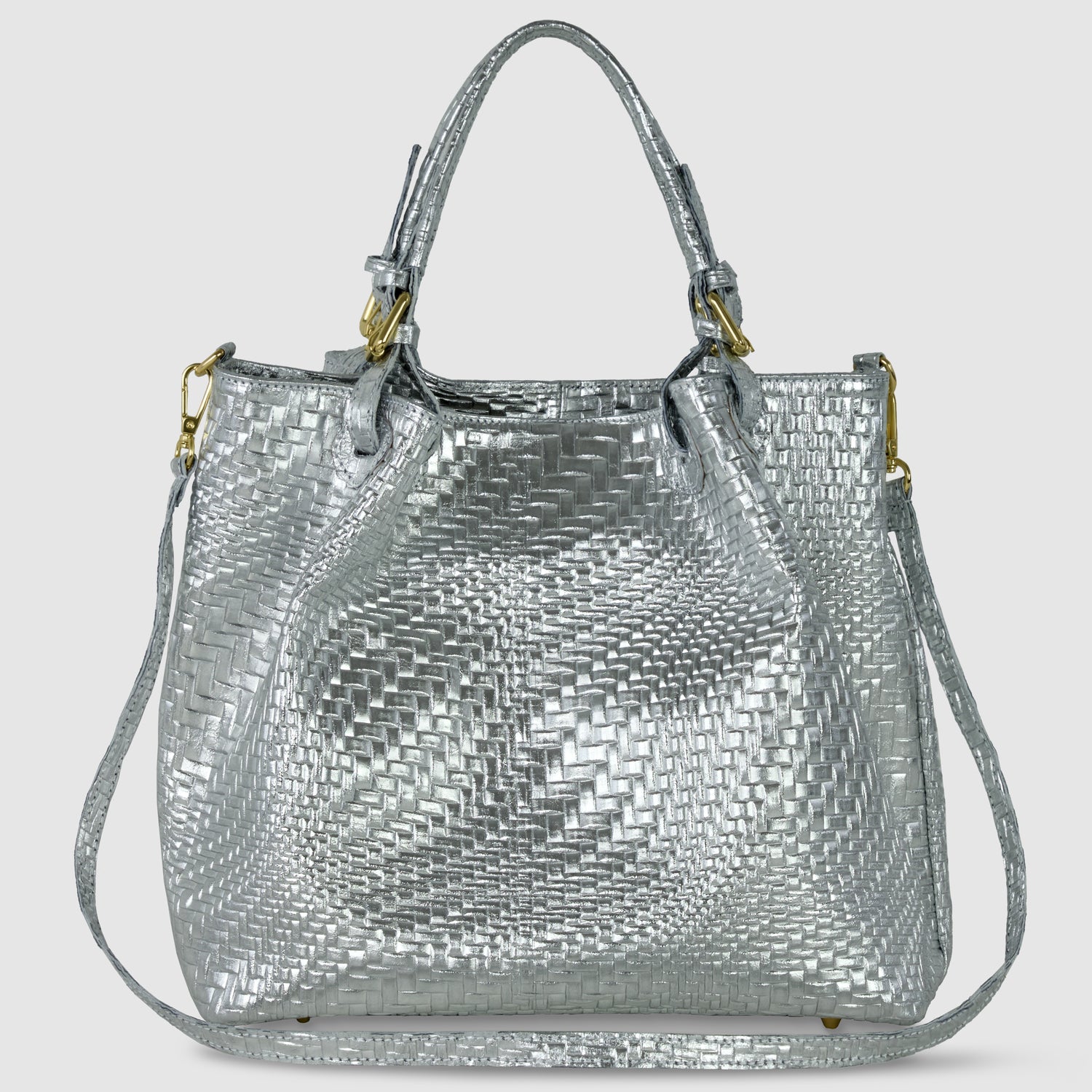 A women’s designer handbag in Grid Metallic Silver, featuring two short handles, a detachable shoulder strap, and gold hardware, displayed against a plain light background.