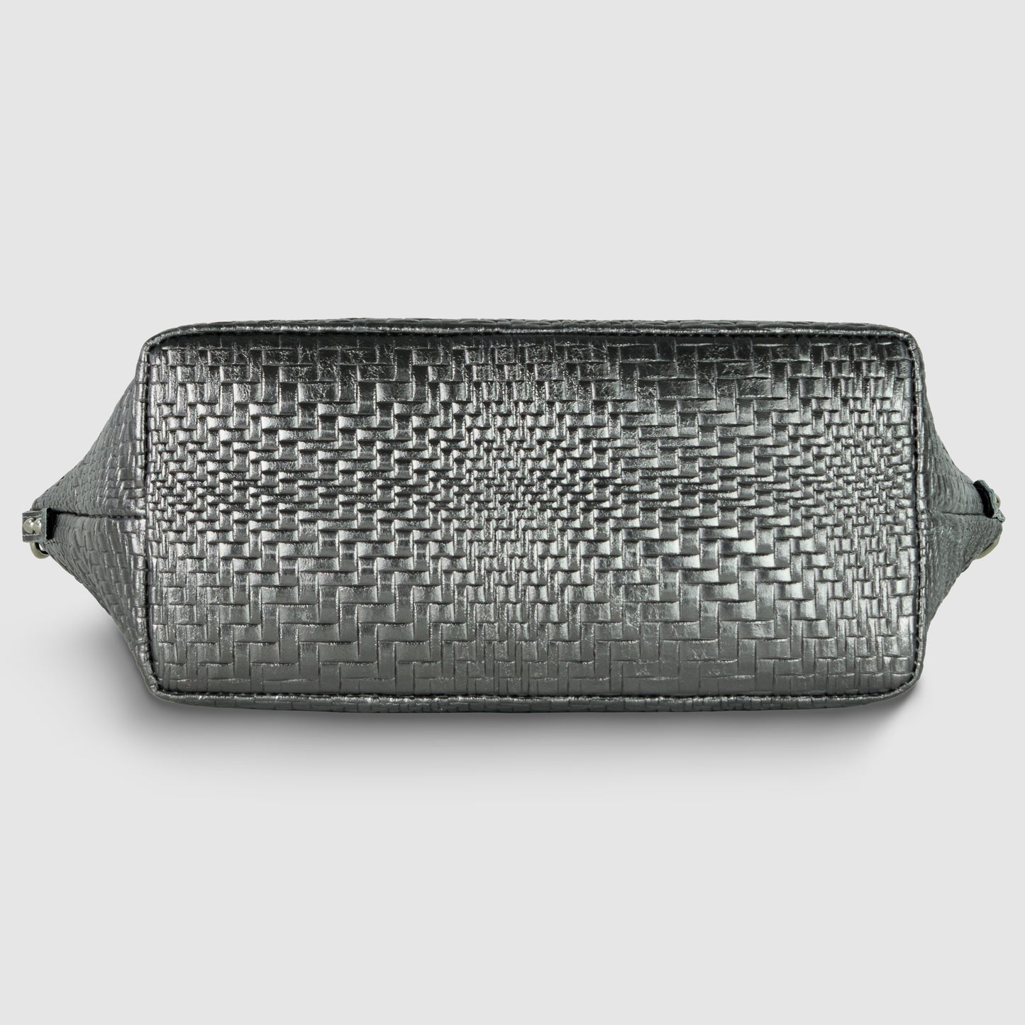 Rectangular Italian leather handbag shown from the bottom, featuring a textured, woven pattern and smooth leather sides with small metal hardware visible on the ends.