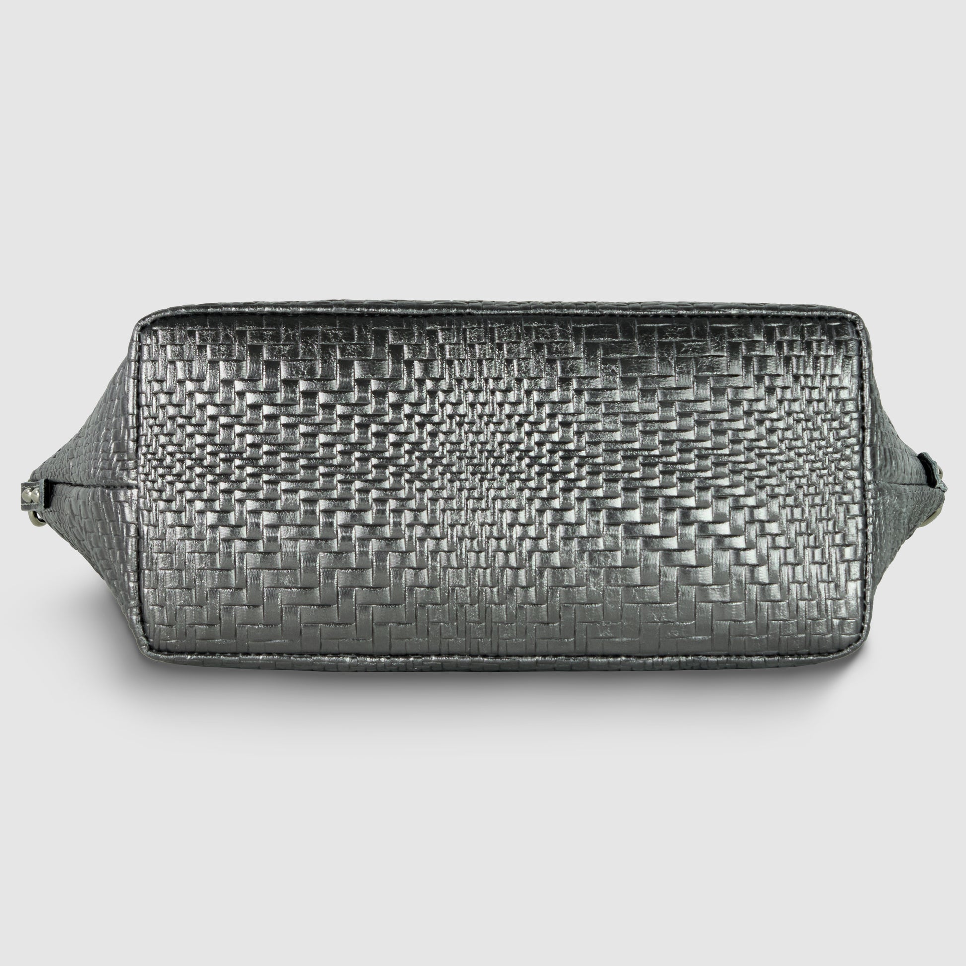 Rectangular Italian leather handbag shown from the bottom, featuring a textured, woven pattern and smooth leather sides with small metal hardware visible on the ends.