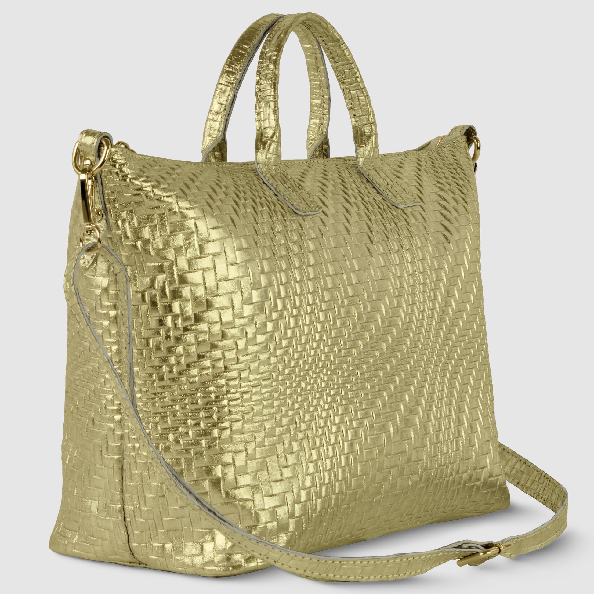 A gold, grid-embossed purse with two short handles and a detachable long shoulder strap, displayed against a light gray background.