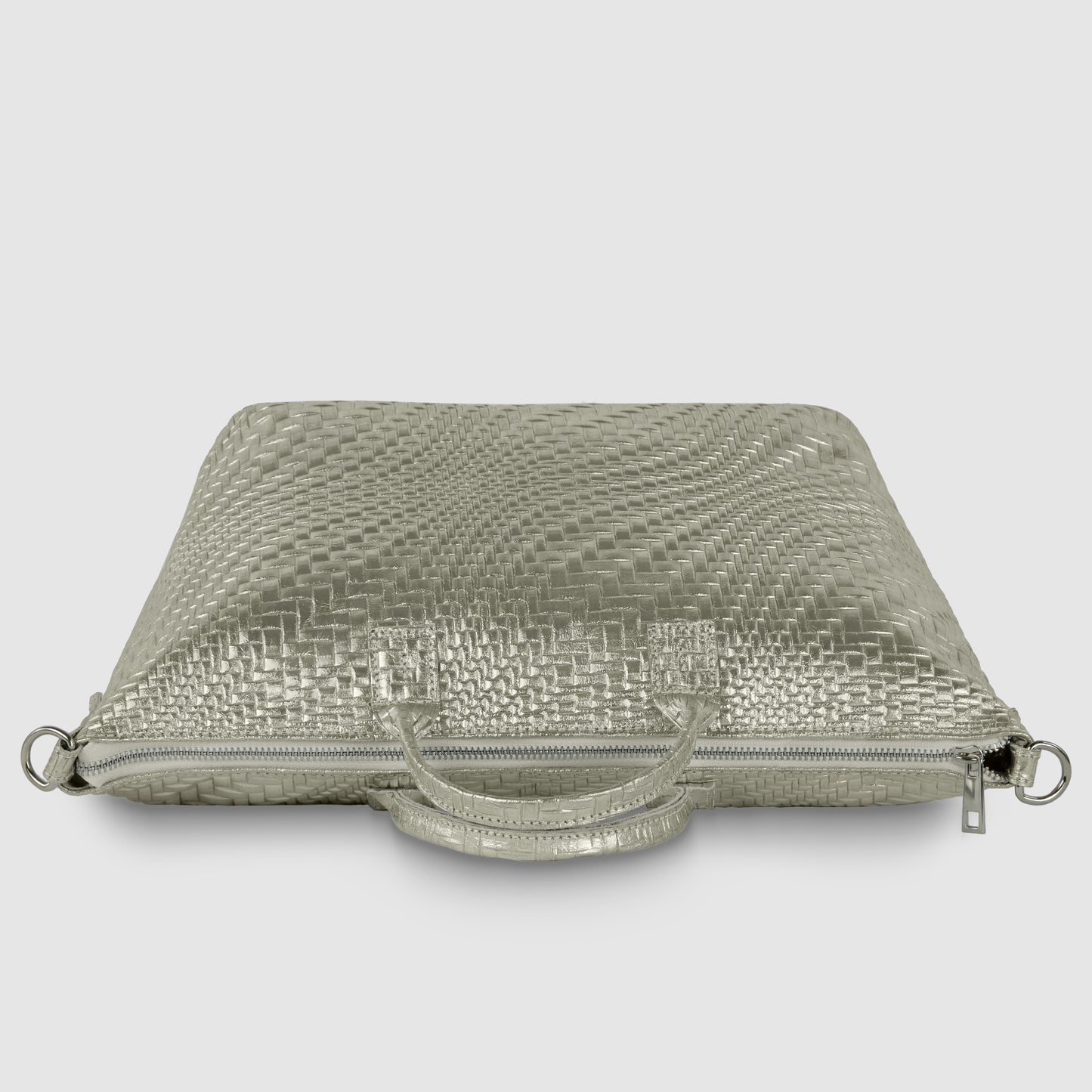 A silver woven-texture clutch or laptop case with a metallic finish, featuring two top handles and a zipper, photographed against a plain white background.