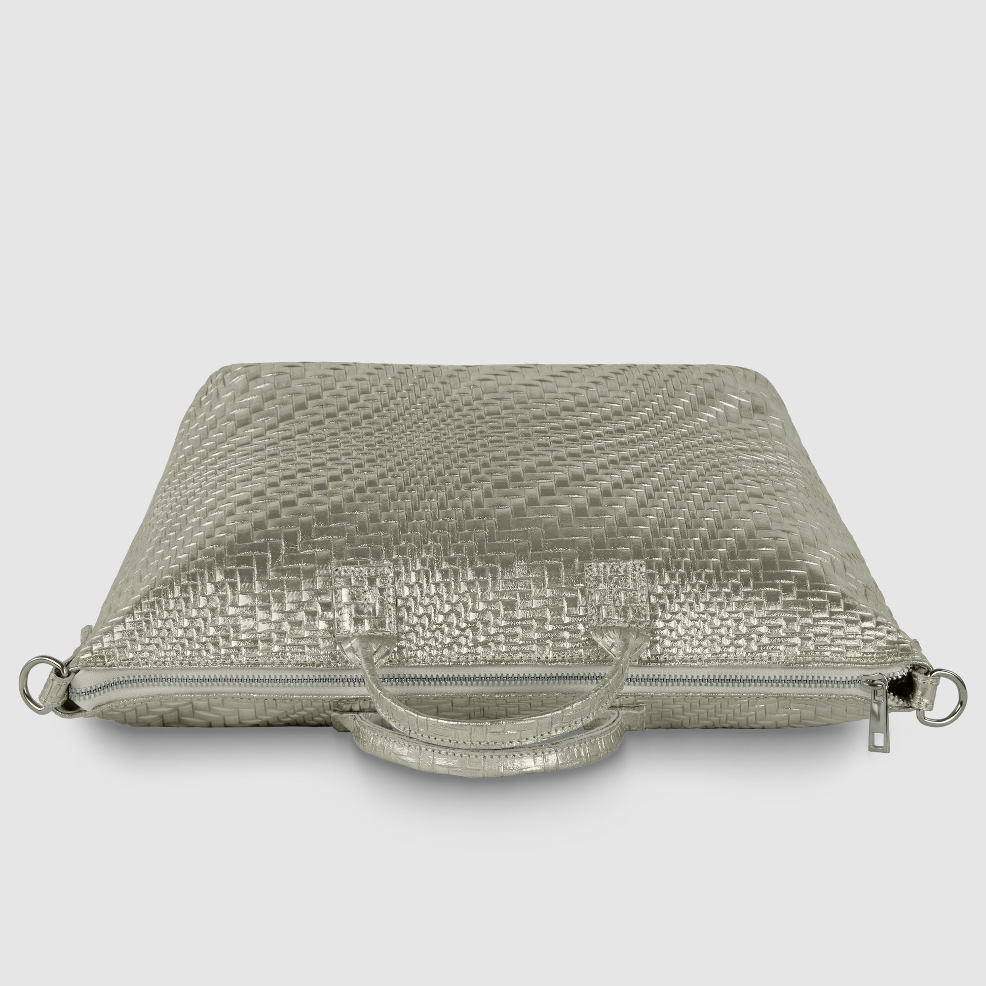 A silver woven-texture clutch or laptop case with a metallic finish, featuring two top handles and a zipper, photographed against a plain white background.