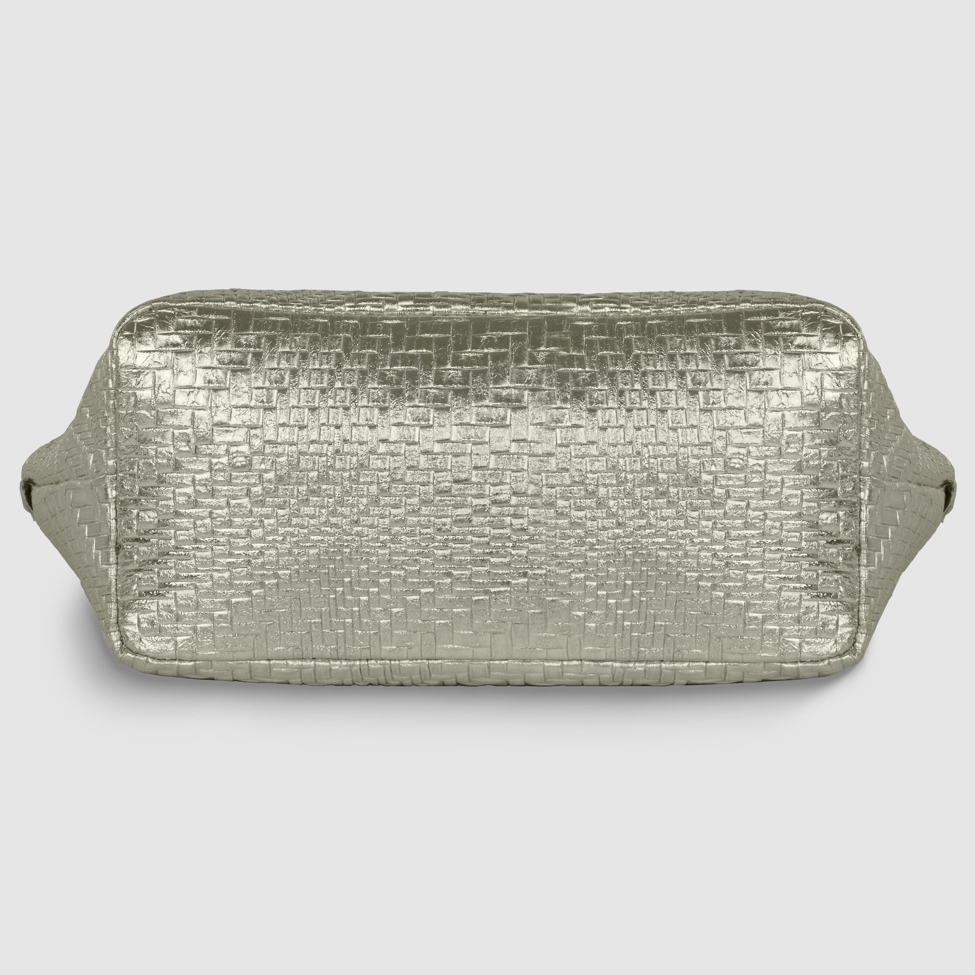 A rectangular metallic finish purse in silver, featuring a woven textured pattern, is shown against a plain light gray background.