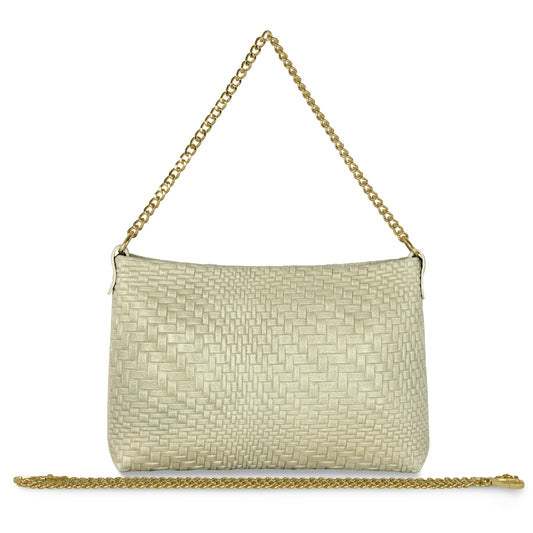 A Grid Beige Florentine leather clutch purse with a gold chain handle stands upright, while a longer gold chain is laid horizontally in front of it.