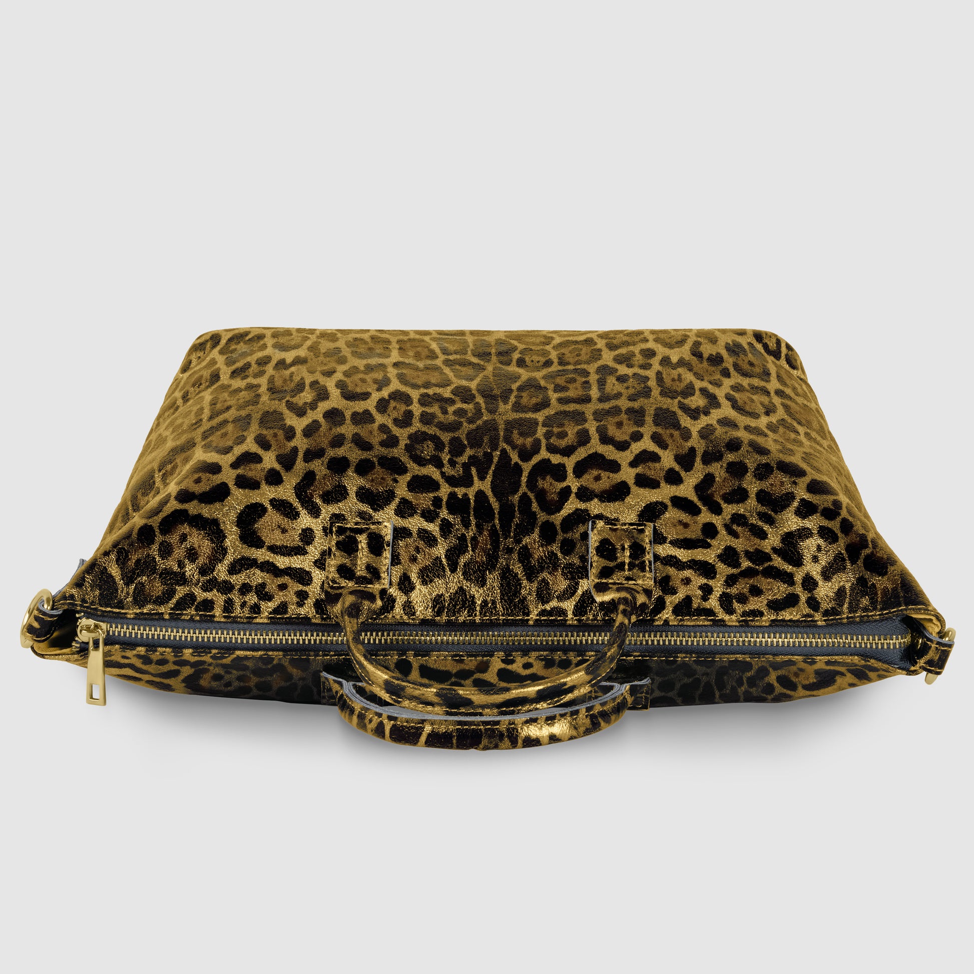 A flat, rectangular metallic leopard print handbag with two short handles and a gold zipper, displayed against a plain gray background.