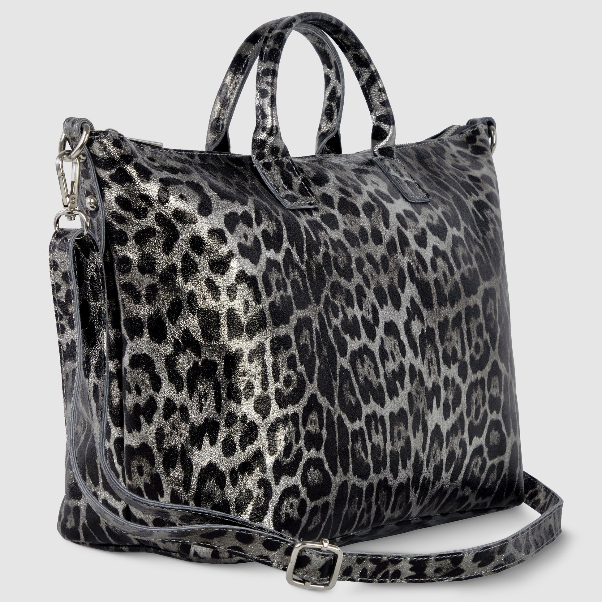 A large TAKEASY handbag with two short handles and a long adjustable strap, featuring a shiny black and silver metallic leopard print pattern.