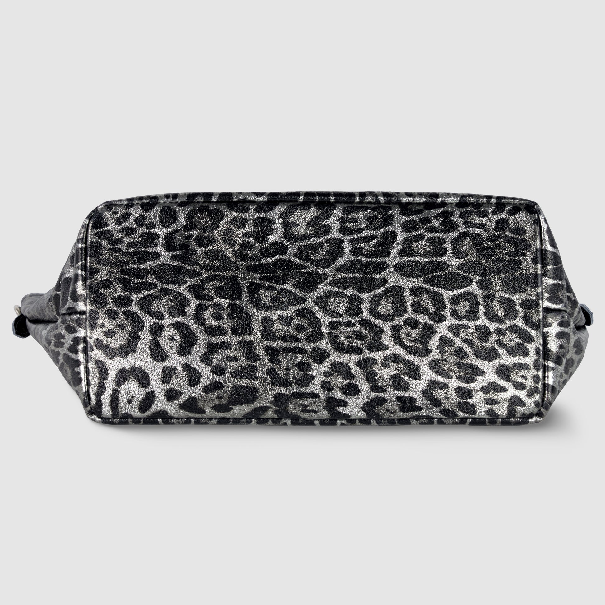 Rectangular TAKEASY handbag featuring a black and gray leopard print pattern, shown from the bottom against a plain light gray background.