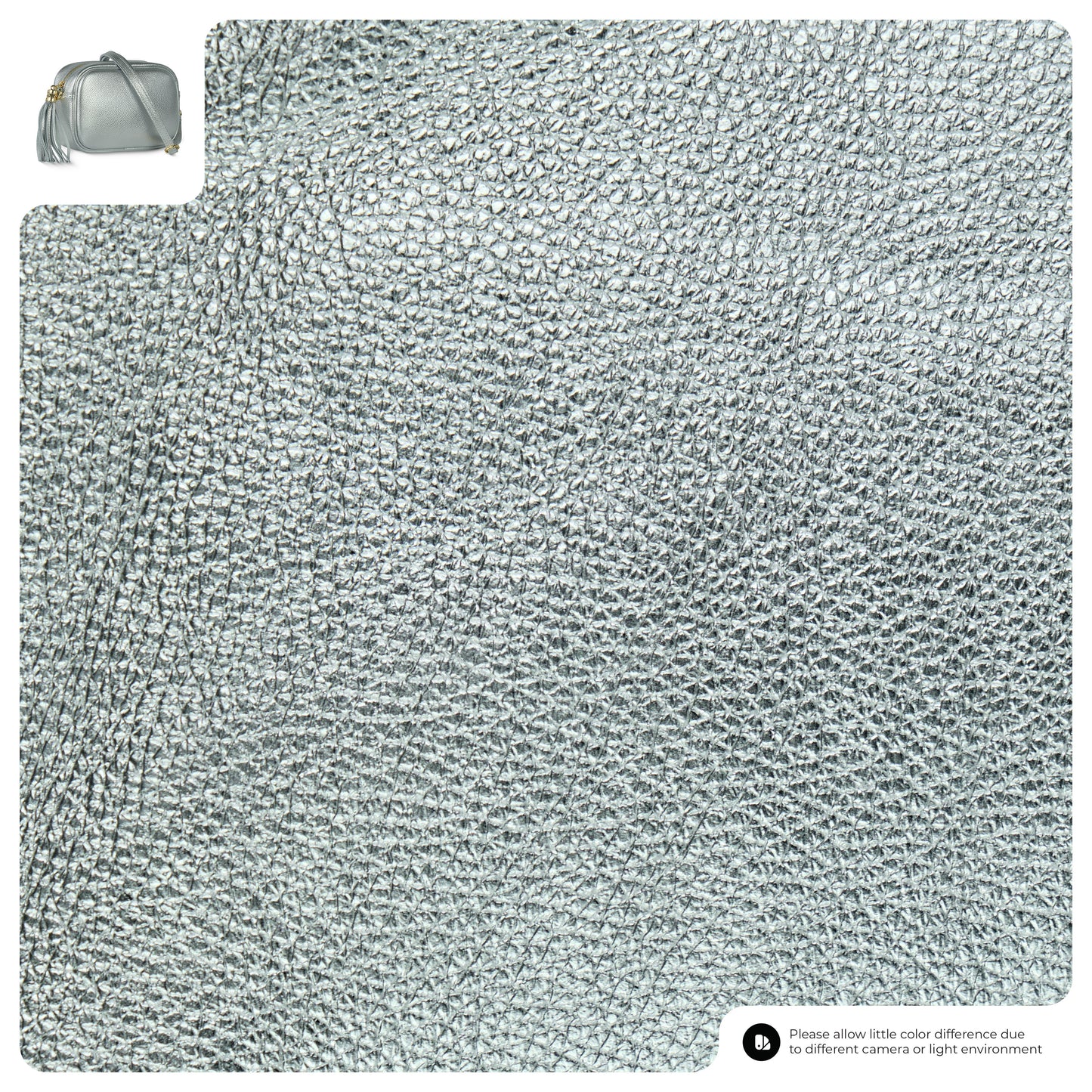 Silver textured fabric with a small gray handbag in the corner.