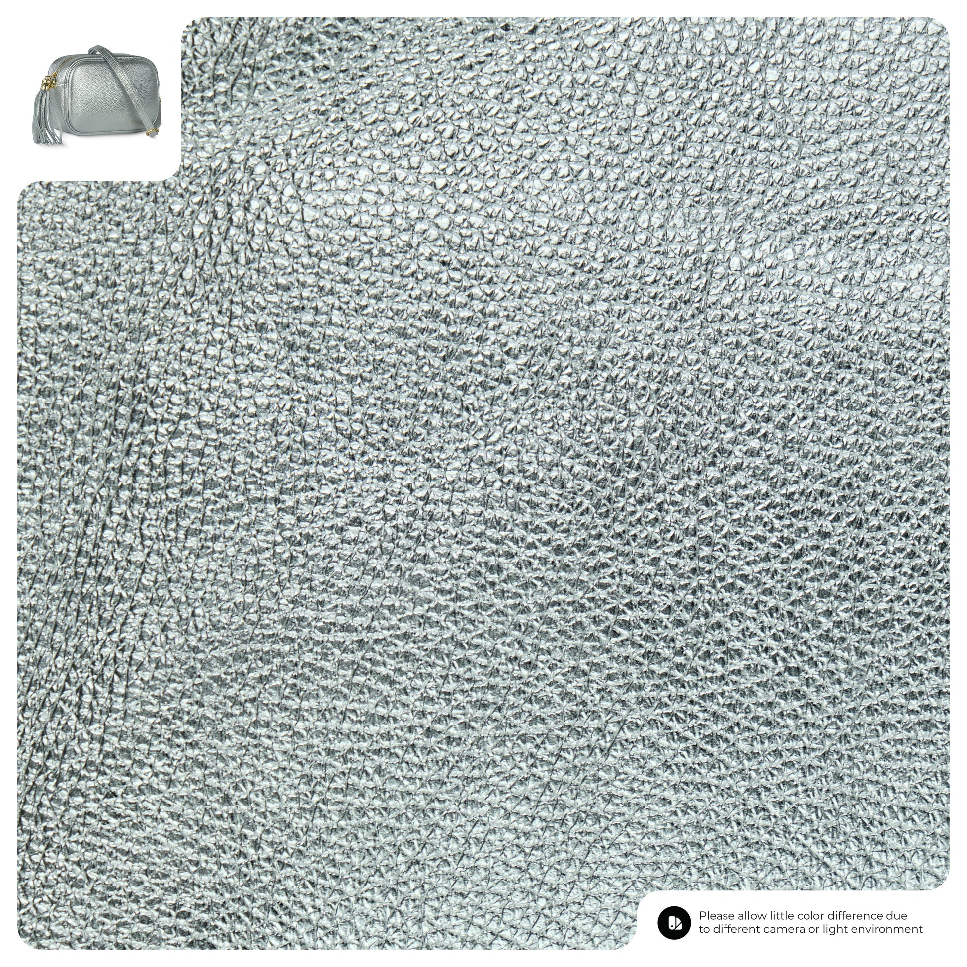 Silver textured fabric with a small gray handbag in the corner.