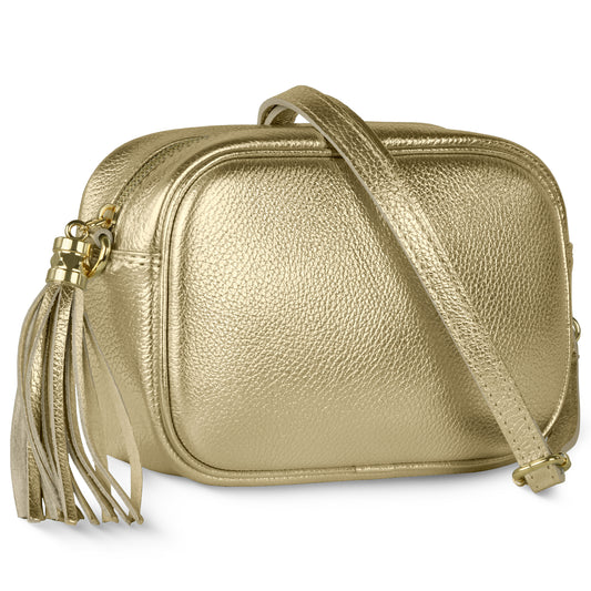 A small rectangular crossbody handbag in metallic gold, featuring a textured calfskin surface, long adjustable strap, and a large side tassel.