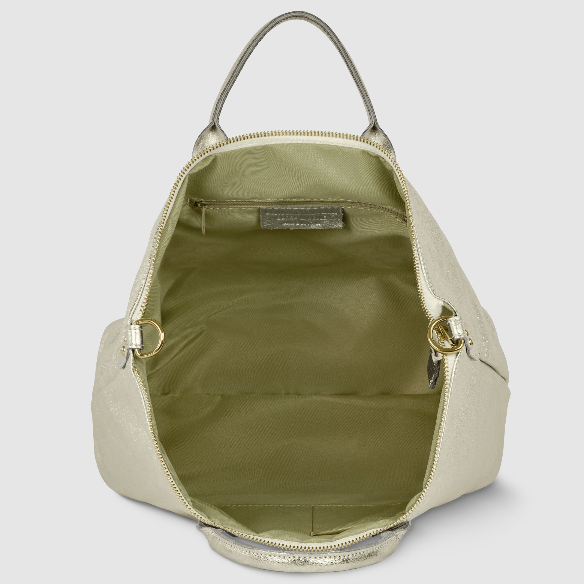 A light gold Italian handbag shown open, revealing a spacious olive green interior with a small inner pocket and gold zipper. The bag features a top handle and elegant gold hardware.