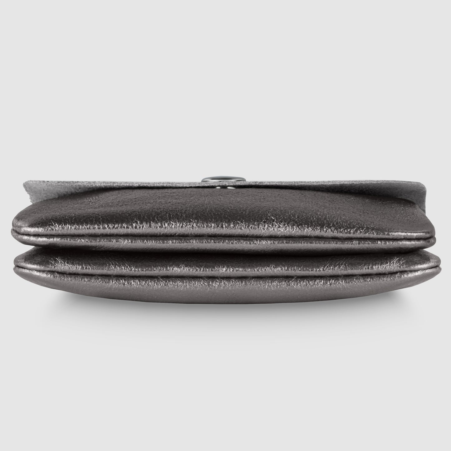 A metallic silver Gleam Suede Leather wallet, soft and stylish, is seen from the front with its top flap slightly open, lying flat against a plain light gray background.