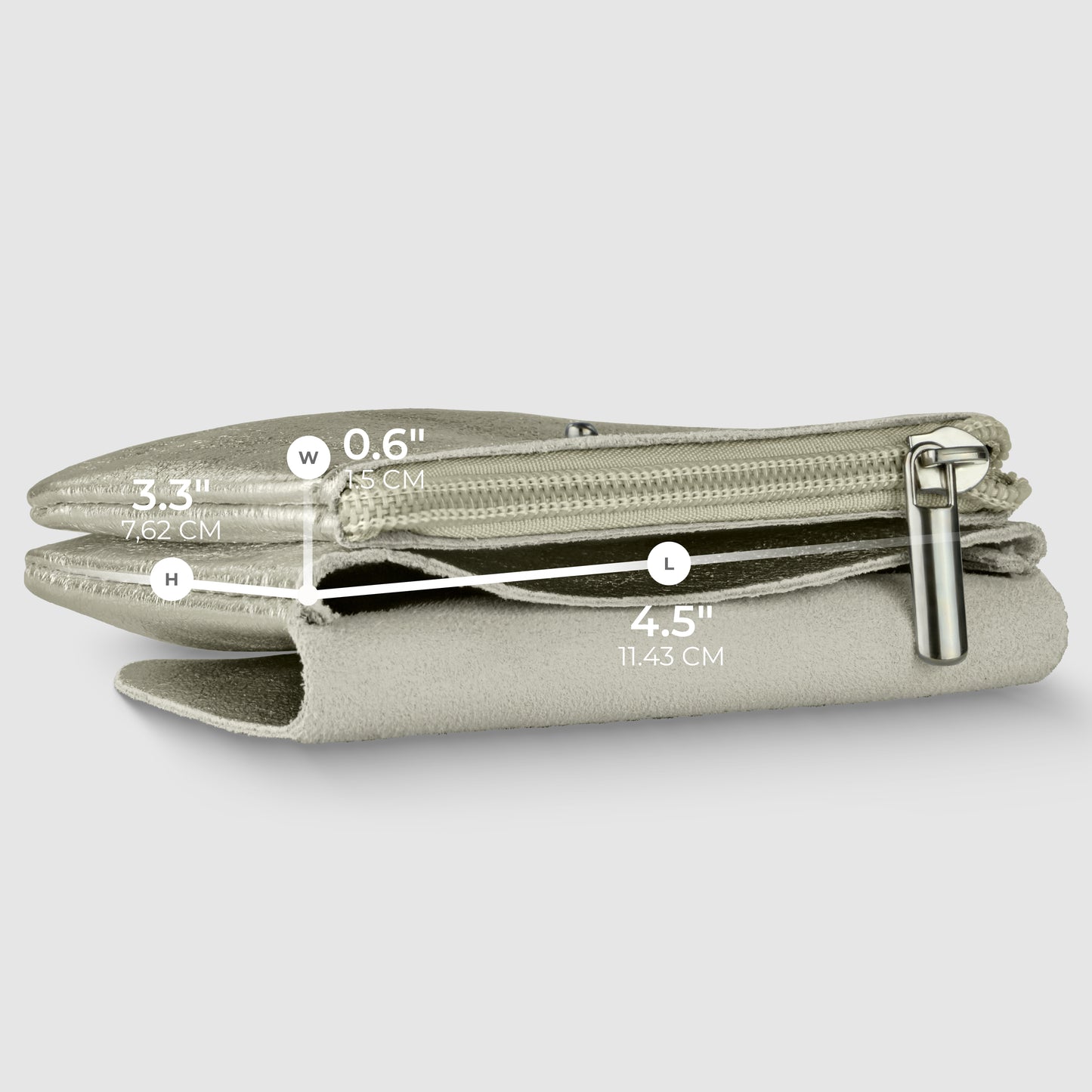A light gray Gleam Suede Leather zippered pouch lies flat, displaying its dimensions: 3.3 (height), 4.5 (length), and 0.6 (width). The metal zipper pull adds a touch of quiet luxury against the plain light gray background.
