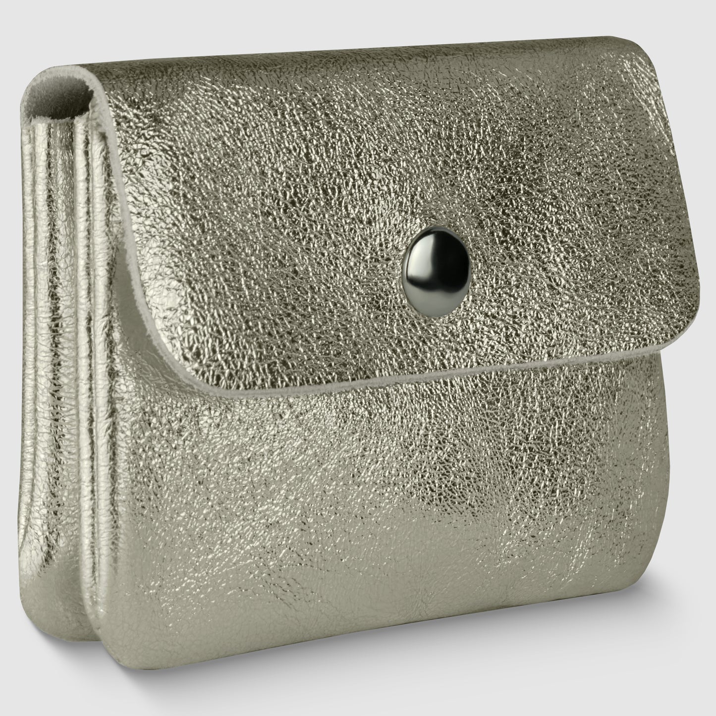 A metallic silver textured clutch purse in Gleam Suede Leather, embodying quiet luxury, features a flap closure secured by a single black button, displayed against a plain light background.