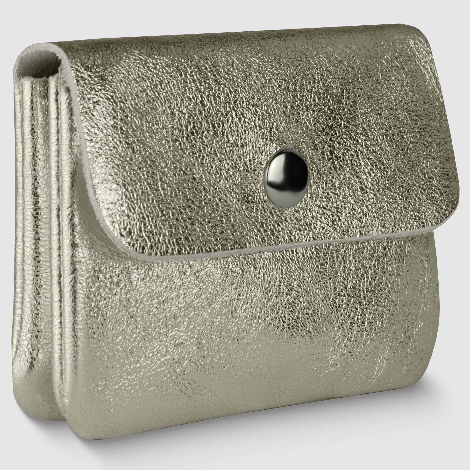 A metallic silver textured clutch purse in Gleam Suede Leather, embodying quiet luxury, features a flap closure secured by a single black button, displayed against a plain light background.