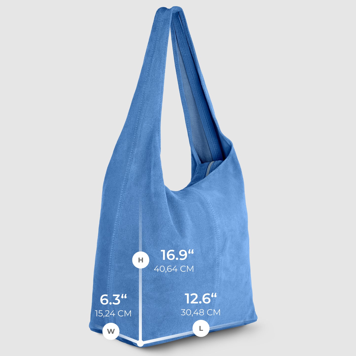 A blue Italian suede bag stands upright. Measurement lines indicate its height as 16.9 (40.64 cm), width as 6.3 (15.24 cm), and length as 12.6 (30.48 cm). The background is light gray, highlighting Florentine craftsmanship details.