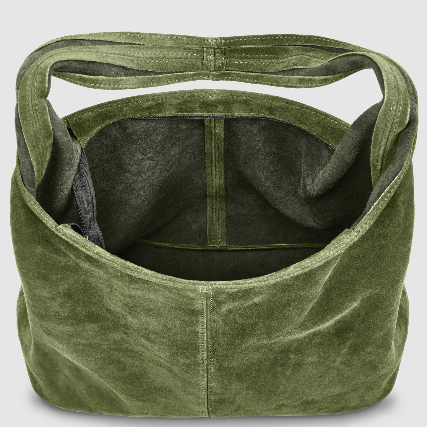 An open, olive green genuine suede leather tote bag is shown from above, revealing a spacious interior with a single pocket on one side. The soft material and unstructured shape highlight its effortless elegance.
