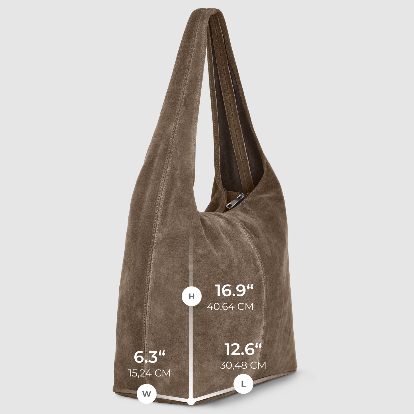 Brown Italian suede bag with a long strap, shown in side view on a light gray background. Dimensions: height 16.9 (40.64 cm), width 6.3 (15.24 cm), length 12.6 (30.48 cm). A chic minimalist shoulder bag for any occasion.