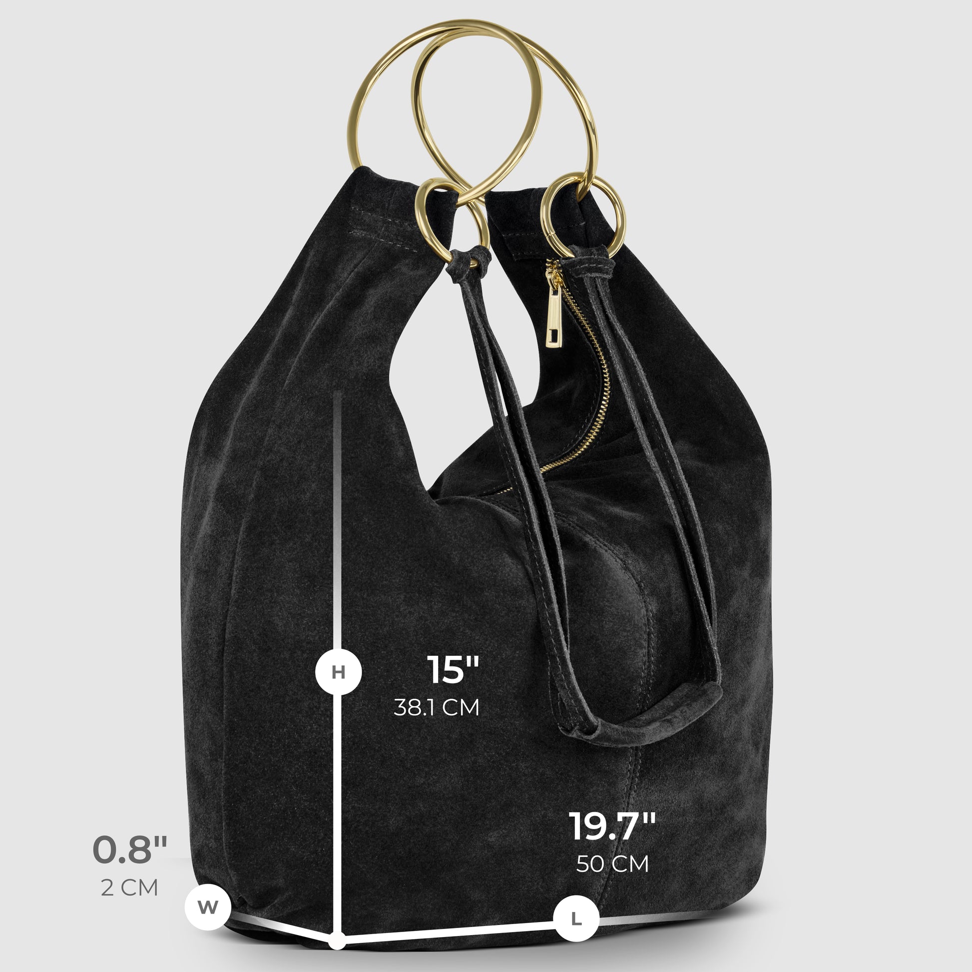 A natural suede bag with gold ring handles is shown upright. Dimensions are 15 (38.1 cm) high, 19.7 (50 cm) long, and 0.8 (2 cm) wide. This Italian handmade bag features a zippered pocket and drawstring sides for added style.