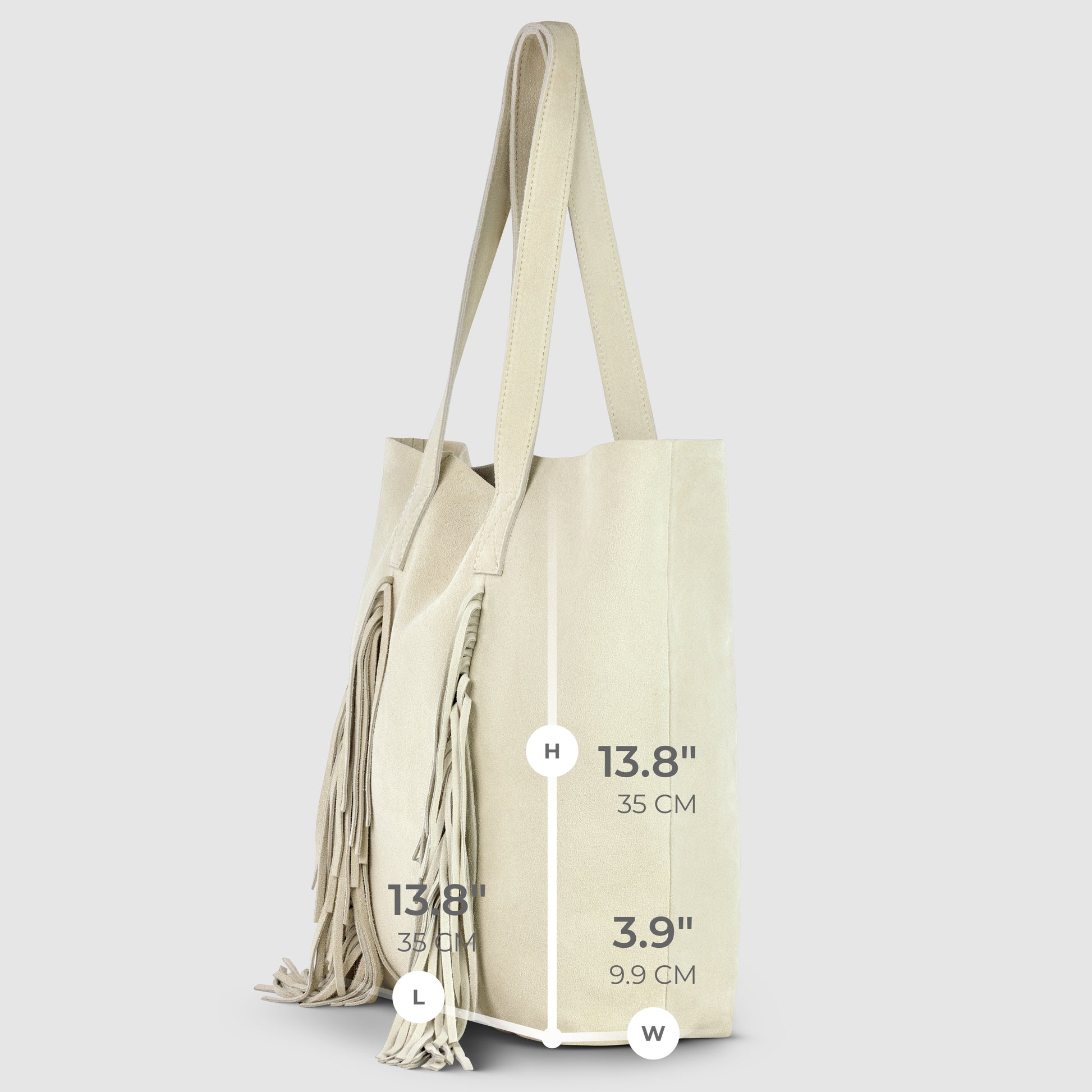 Beige suede tote bag with tassel details on the side—a chic bohemian handbag. Dimensions: height 13.8 inches (35 cm), length 13.8 inches (35 cm), and width 3.9 inches (9.9 cm).